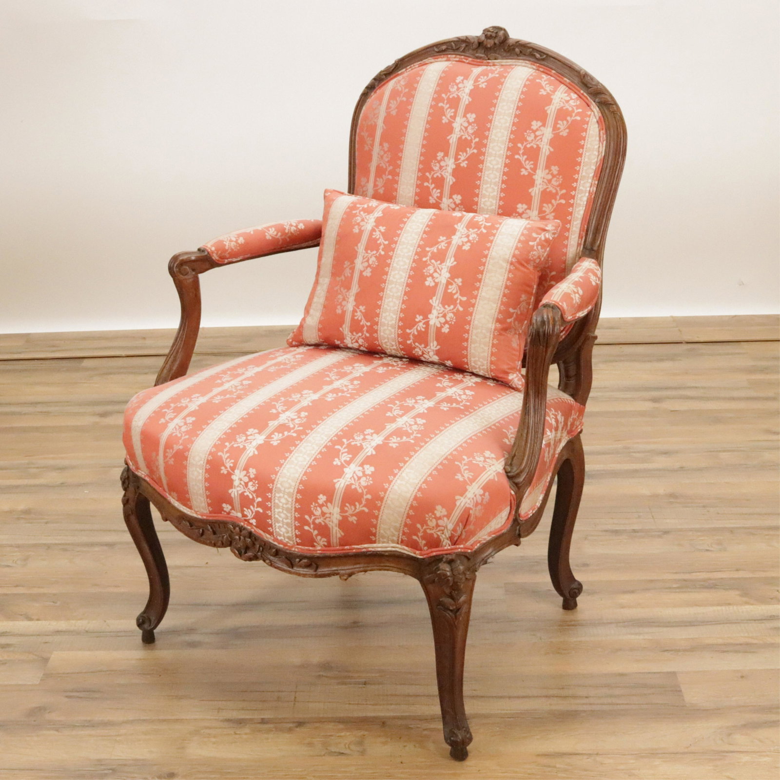 Louis XV Beechwood Fauteuil, Mid 18th C.: Louis XV Beechwood Fauteuil, Mid 18th C., indistinctly stamped, upholstered in foliate salmon brocade Dimensions: 36 3/4" H x 27 1/2" W x 28 1/2" D Property from the collection of Isabella Leeds, remo