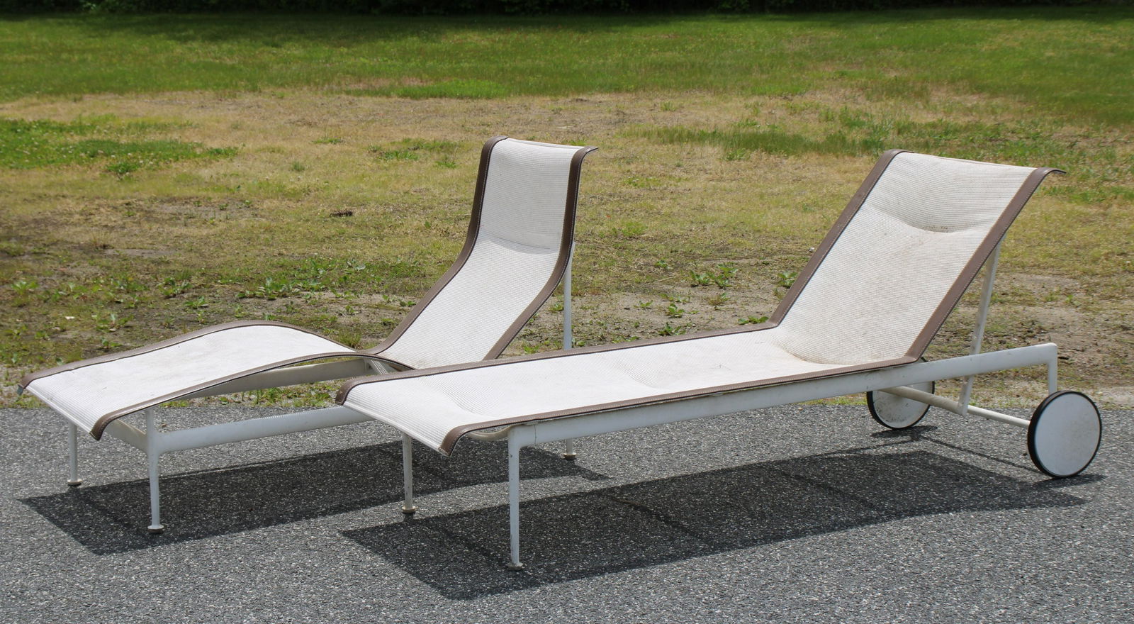 Pair of Richard Shultz Chaise Lounges: Pair of Richard Schultz for Knoll 1966 chaise lounge chairs, USA, 1966/c. 1995 ,enameled aluminum, nylon, leather (with covers) Dimensions: 34"H x 23"W x 60"D Property from the estate of a former Vice