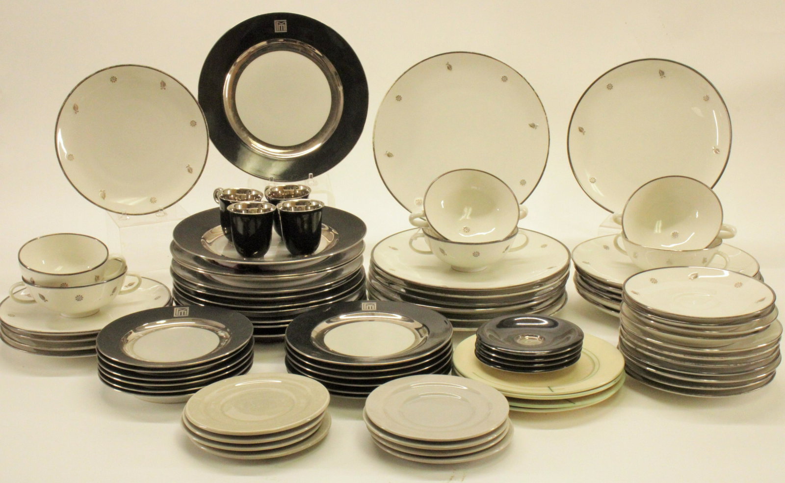 2 Part Dinner Services, Sevres & Lamberton: Two Partial Dinner Services, Sevres & Lamberton, with extra plates (87 pc.) Dimensions: Dinner plates 10" Dia. Property from the Estate of an Important New York Modernism Dealer (NJWA406/87)(MS)