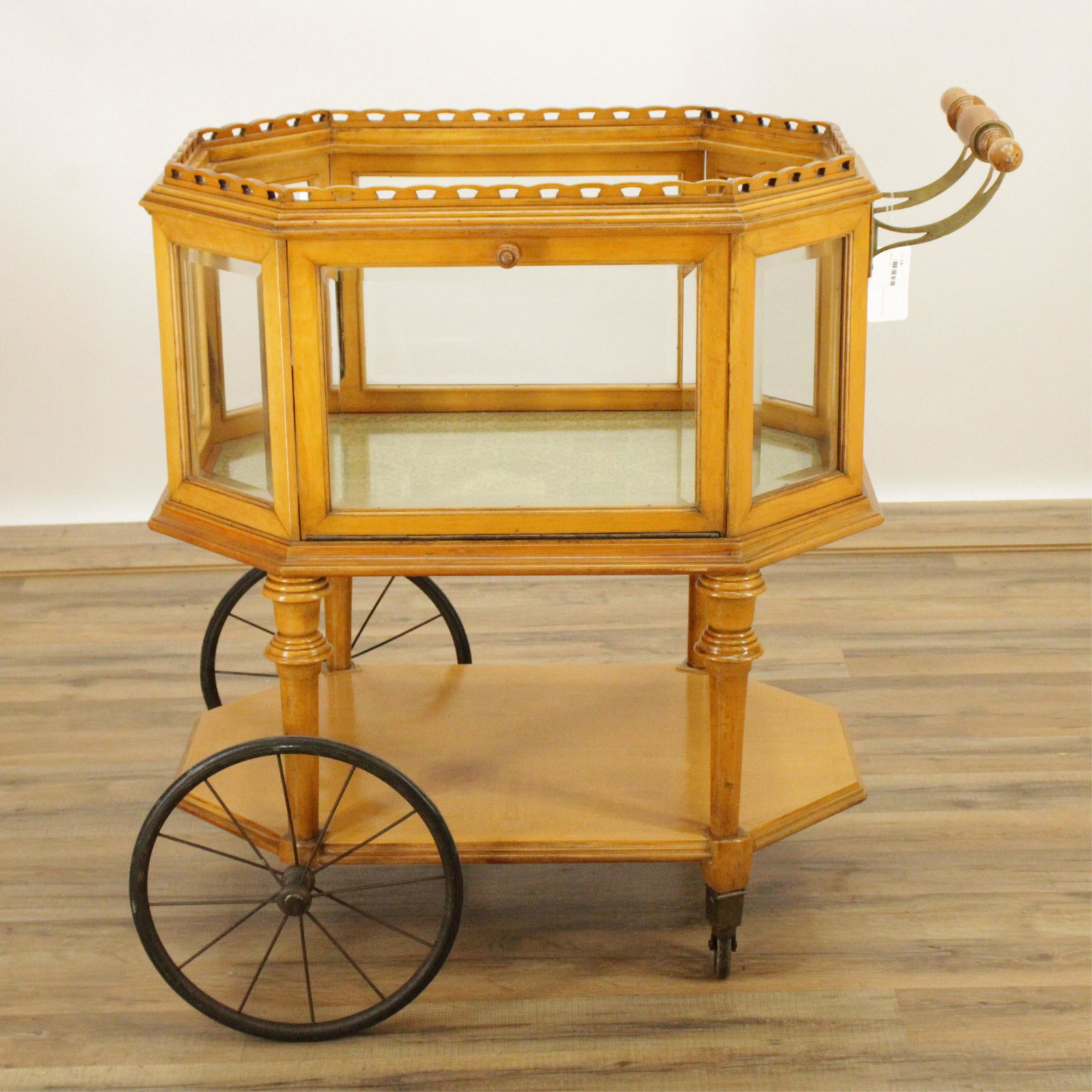 3-Tier Maple & Glass Tea Trolley: 3-Tier Maple & Glass Tea Trolley, multiple side openings Dimensions: 31 1/2" H x 30" L x 18" D Property from the Private Collection of Steven Stark (ALPI018)(WT)