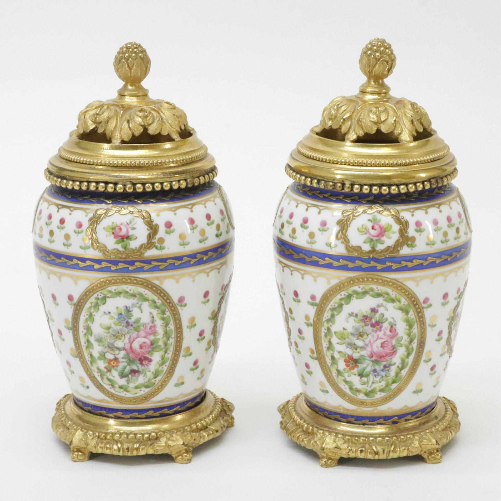 Sevres Style Porcelain Pot-Pourri: Sevres Style Porcelain Pot-pourri, with pierced ormolu lids, footed base Provenance: Sotheby's NYC 9/29/1990. Dimensions: 7" H x 3 1/2" Dia. Property from the Private Collection of Steven Stark (ALPI1