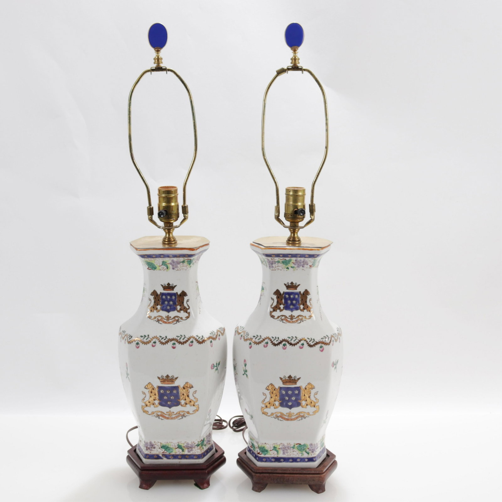 Pair of French Armorial Porcelain Vases as Lamps: with Point gesne-Point Gesnaut Armorial with meandering grape and floral motifs Dimensions: 14 x 7 x 6, 29 1/2 " to top of finial (SCOP107/2)(MM)