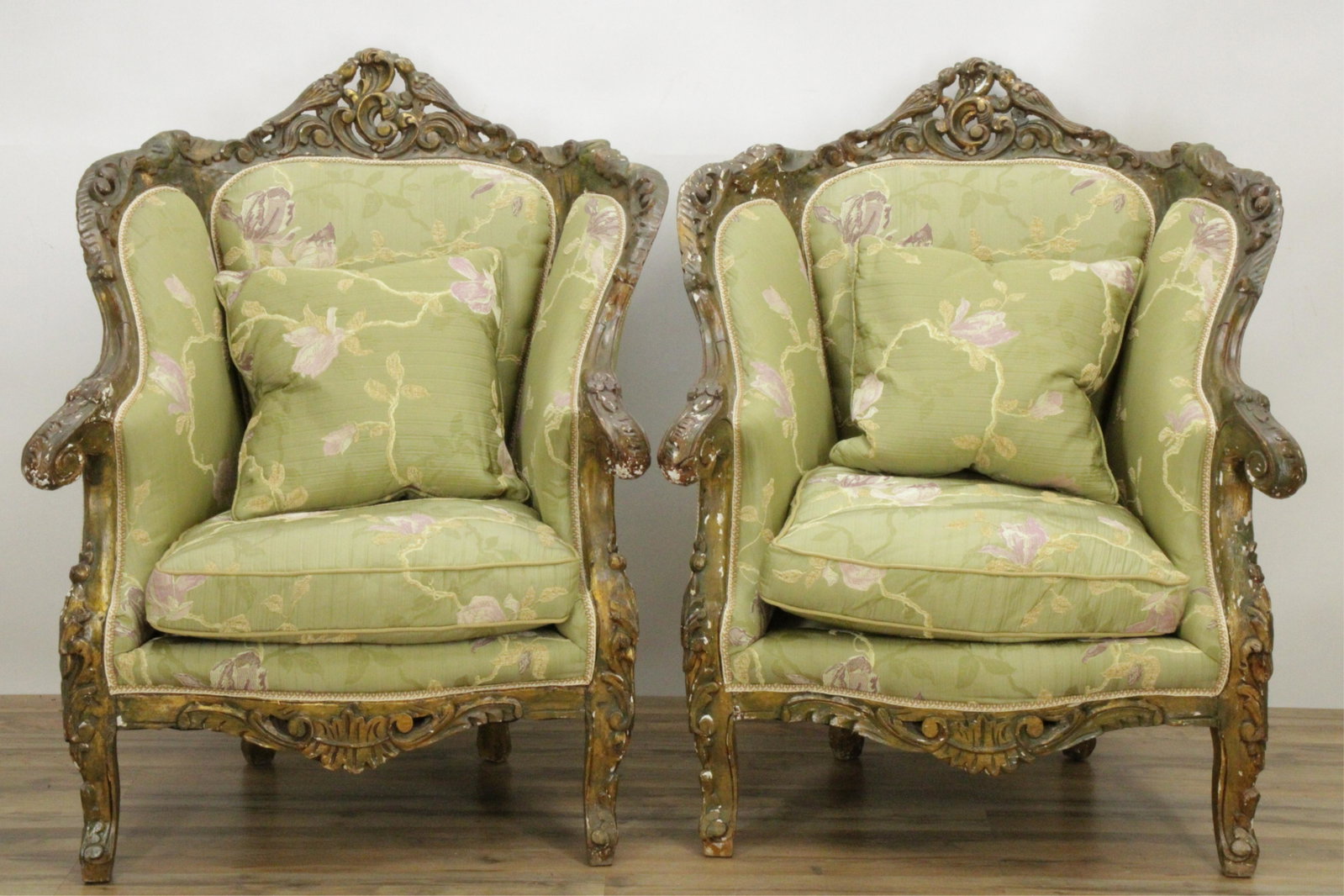 Pair Louis XVI Style Bergere Chairs: with lovebird carved crests, paint over gesso Dimensions: 43"H x 35"W x 34"D (MITK343)(MM)