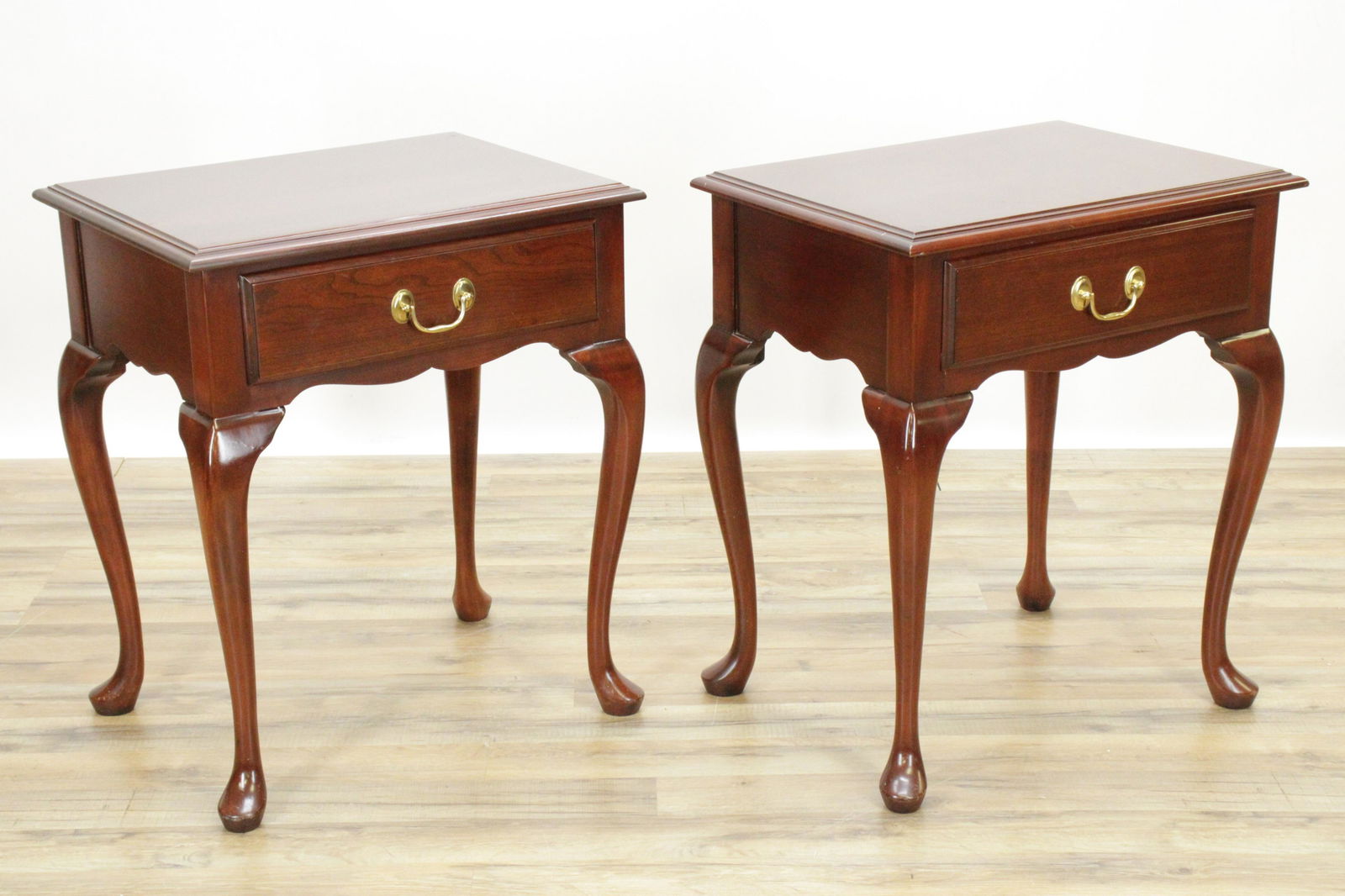 Pair Queen Anne Style Mahogany Lowboys, Harden: Pair Queen Anne Style Mahogany Lowboys, by Harden Dimensions: 26" H x 22 1/4" W x 16" D Property from a Private Katonah Estate (KATO45/2)(MS)