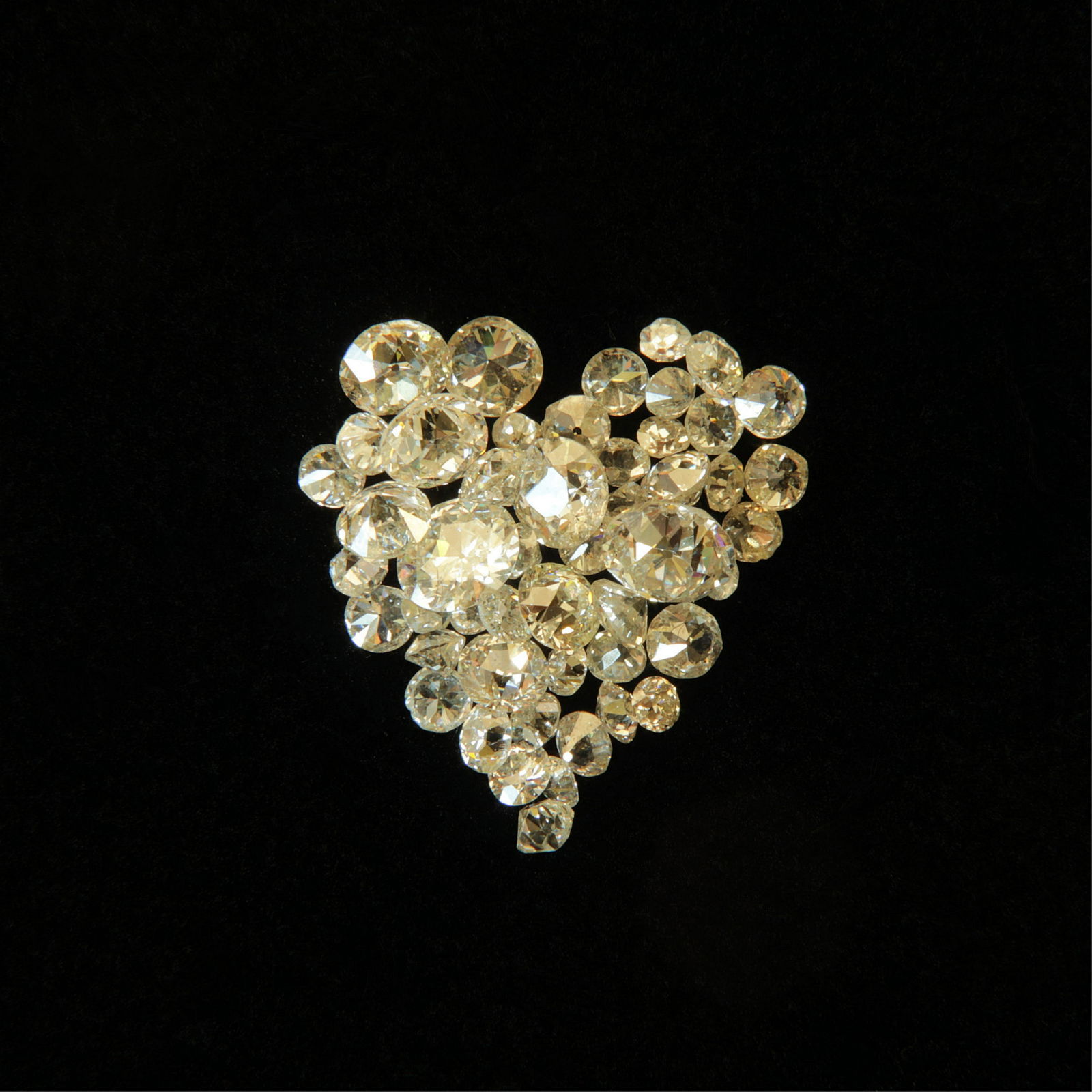 Collection of Loose Diamonds & Rubies: Grouping of 51 loose diamonds weighing 3.31 tcw together with 5 loose rubies weighing 0.33 tcw. Property from an Influential Family, Washington, DC.