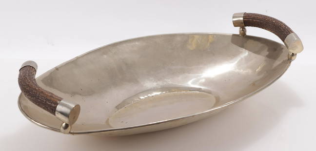 Airedelsur Alpaca Silvered Metal Serving Dish: Airedelsur Alpaca Silvered Metal Large Serving Dish, made in Argentina, horn handlesDimensions: 25" L Shipping is the buyer's responsibility! We recommend obtaining a quote from a third party