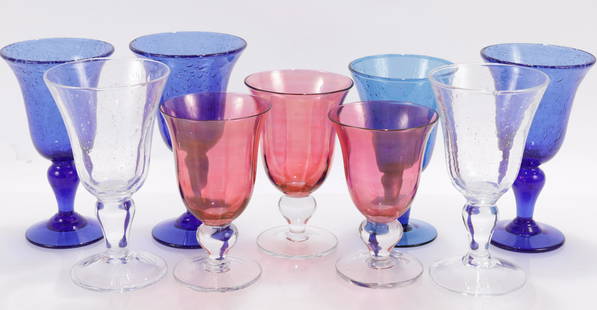 9 Variously Colored Bubble Glass Goblets: 9 Variously Colored Bubble Glass Goblets, some etched BIOTDimensions: 5 1/2" H to 7 1/4" H Shipping is the buyer's responsibility! We recommend obtaining a quote from a third party shipper prior to