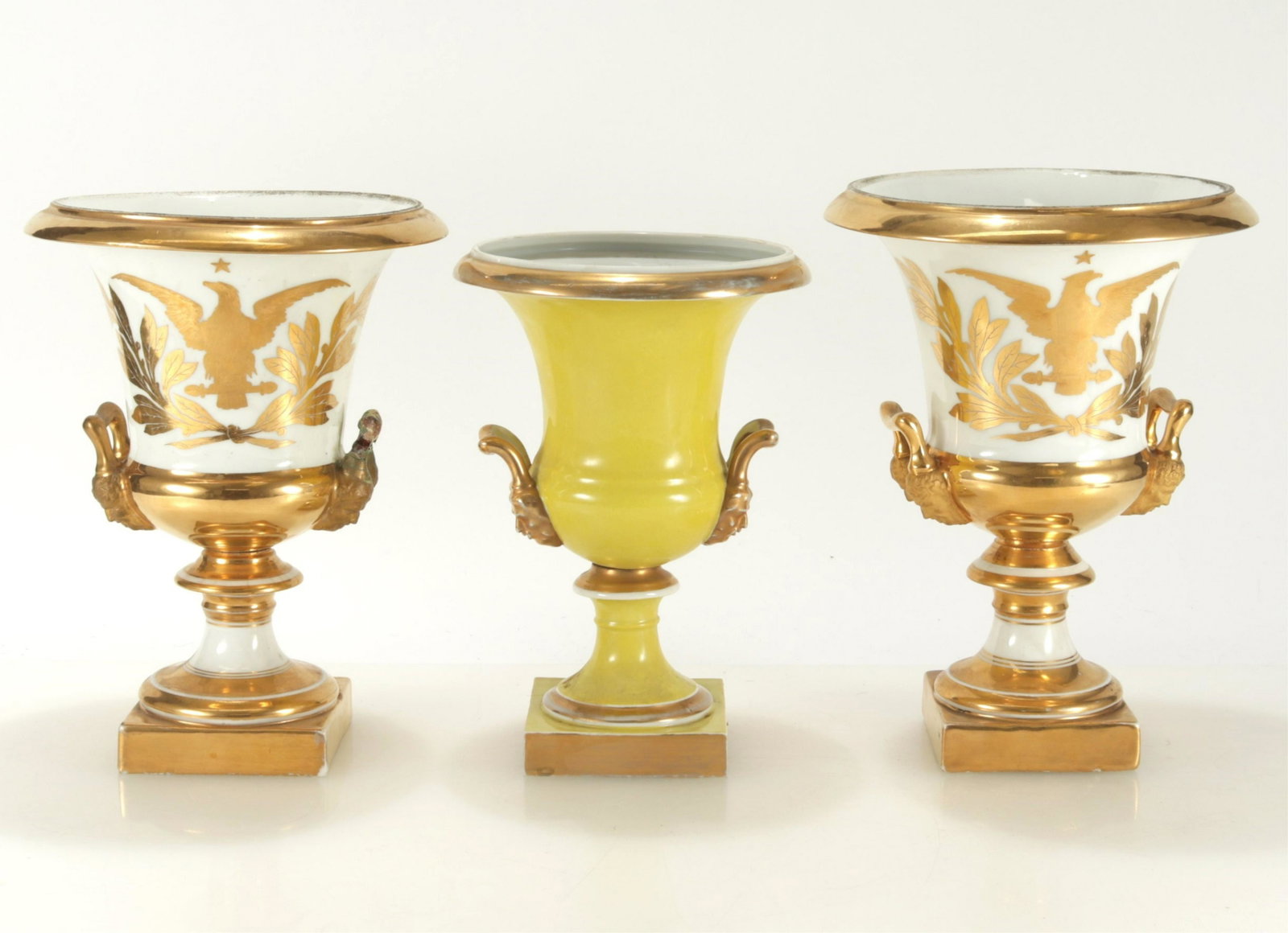 Sevres Style Paris Porcelain Urns & Capodimonte: Pair Sevres Style Paris Porcelain Urns and another yellow ground Capodimonte pairDimensions: Capodimonte pair 10 1/4" H Shipping is the buyer's responsibility! We recommend obtaining a quote from a th