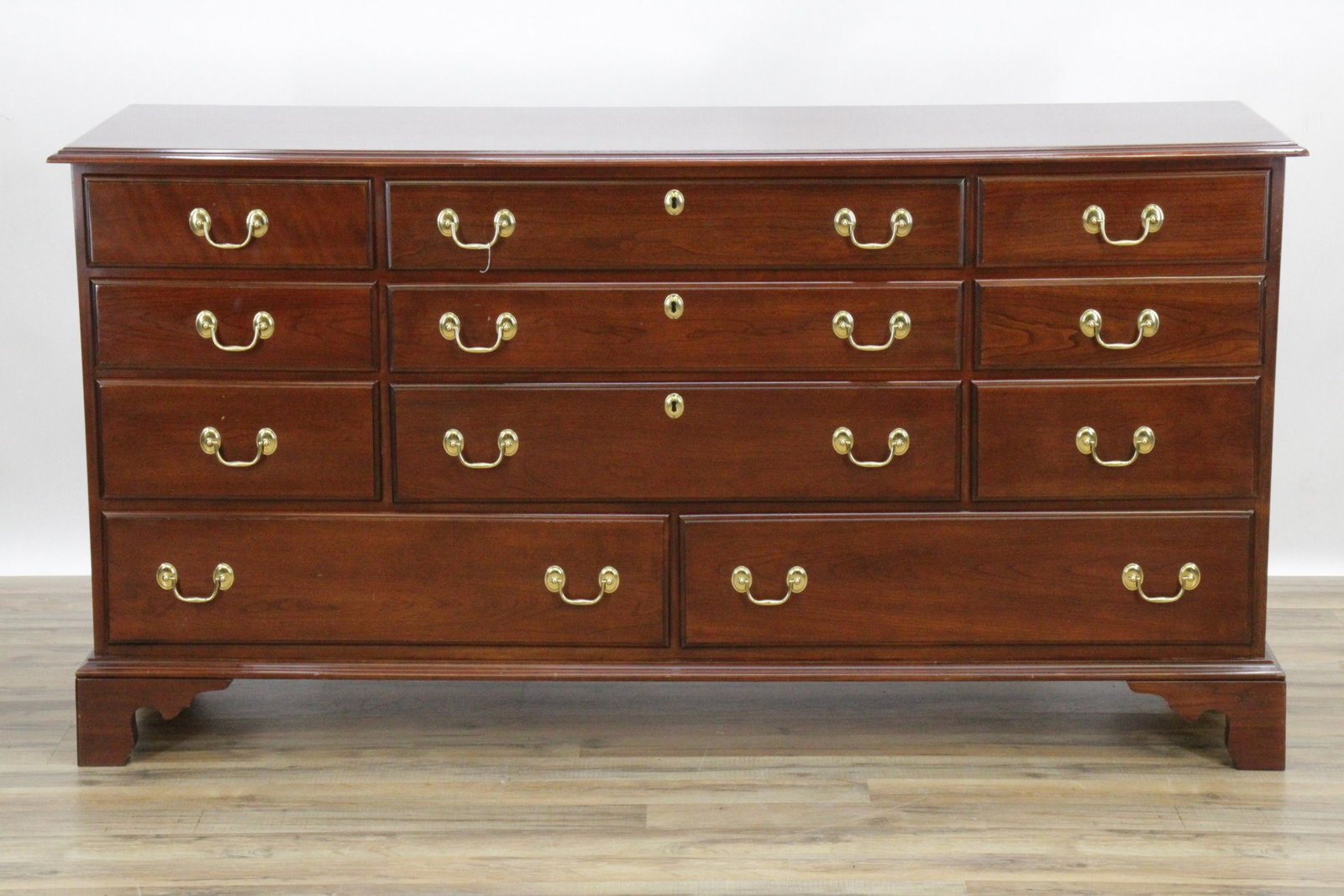 George III Style Mahogany Dresser: George III Style Mahogany DresserDimensions: 34 1/4" H x 66 1/4" W x 19 1/4" D Shipping is the buyer's responsibility! We recommend obtaining a quote from a third party shipper prior to bidding