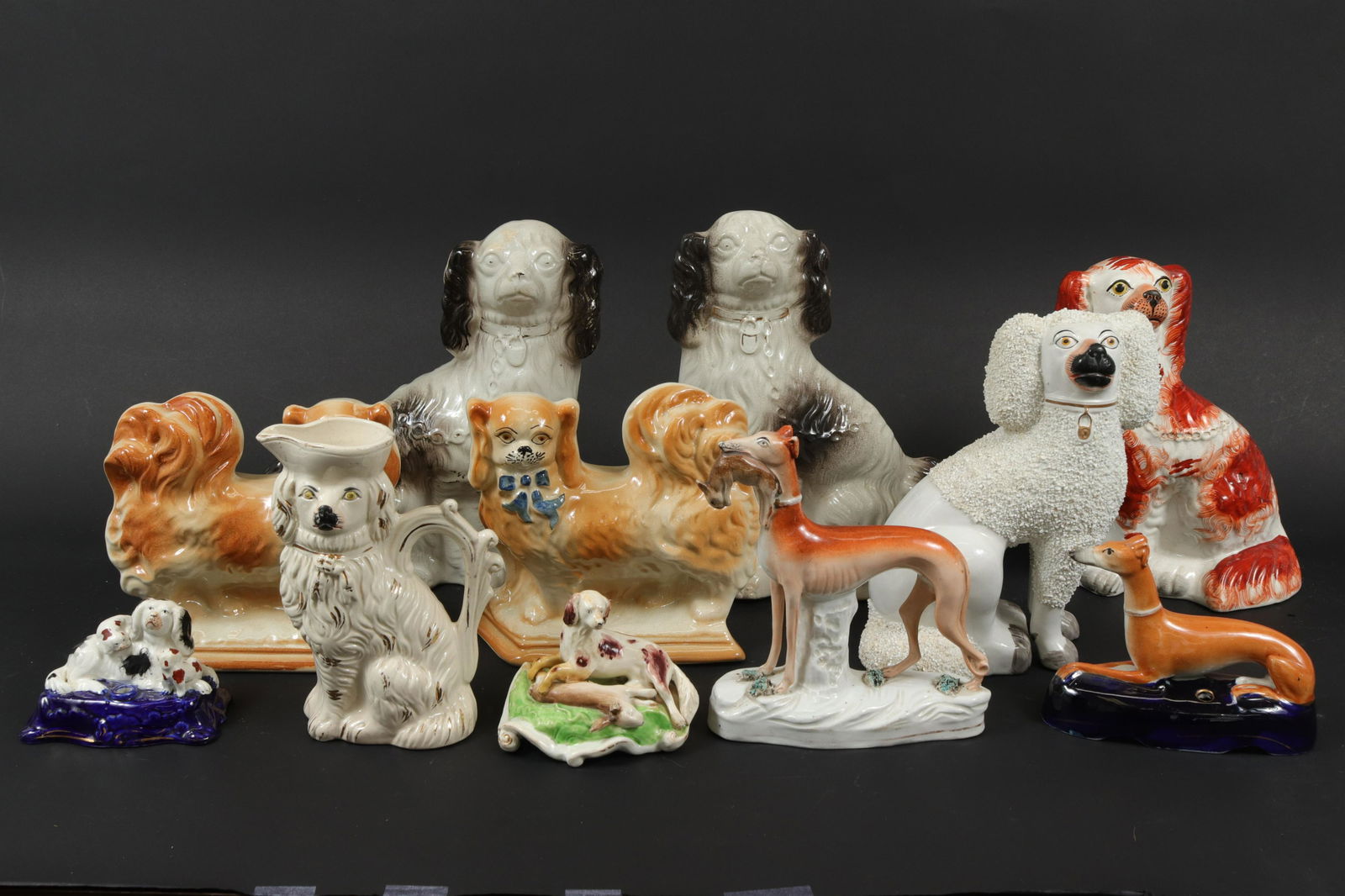 Group of 11 Staffordshire Dog Figurines (1 of 9)
