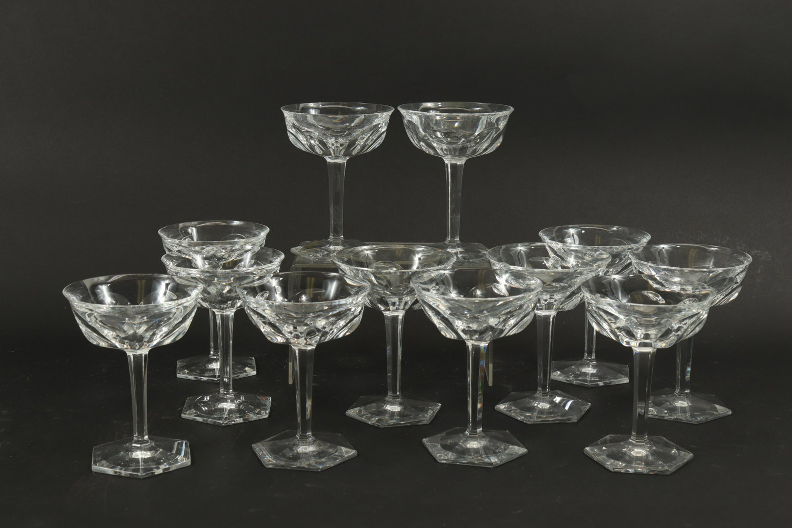 Set of 12 Baccarat Malmaison Champagne Glasses: A complete set of 12 Baccarat champagne / tall sherbet glasses in the Malmaison pattern. Each acid etched on bottoms. (MPOS735/12)(SCL) Dimensions: 5.5" H x 4" dia Property from the Estate of Miriam S