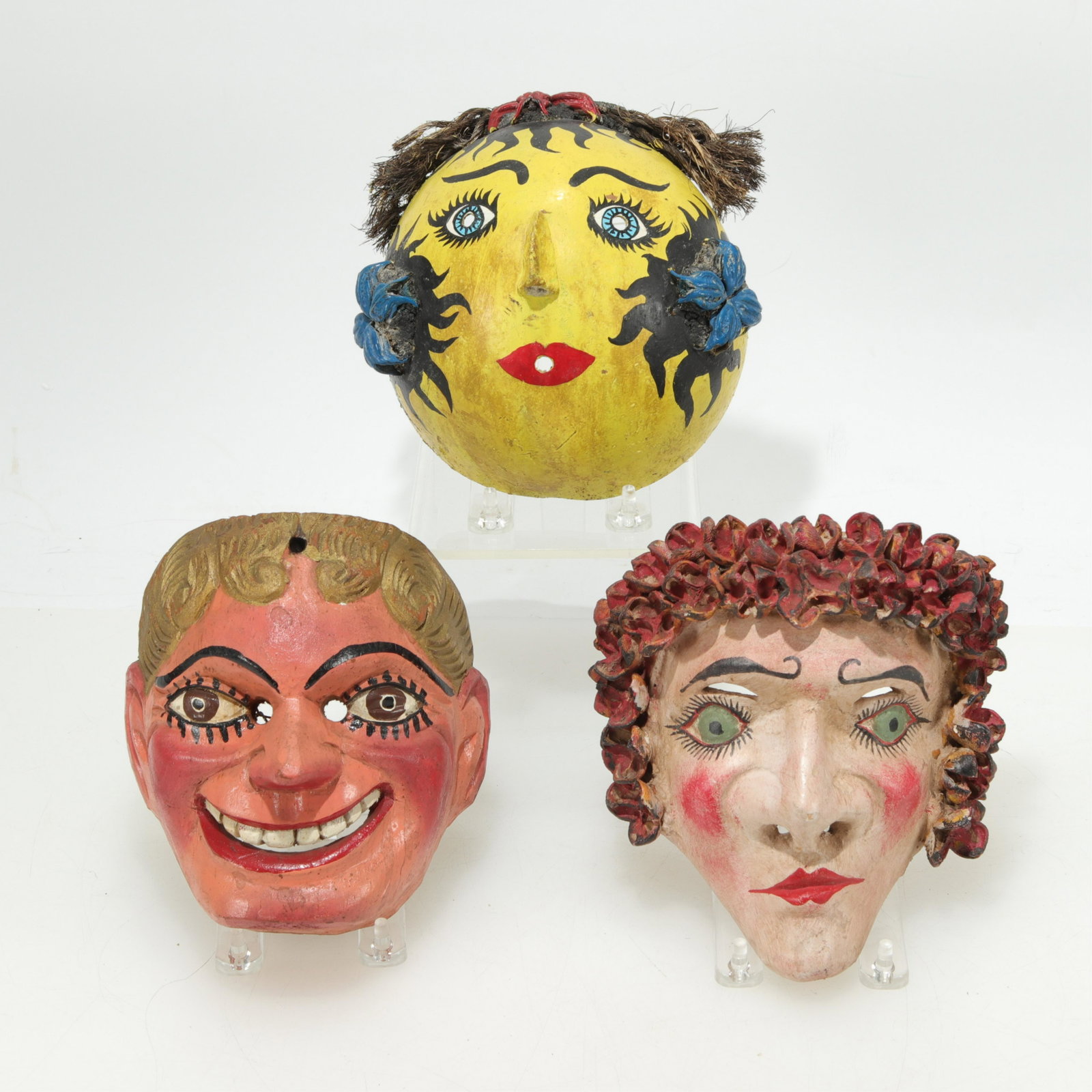 Mexican and Guatemalan Painted Carnival Masks: 3 Mexican and Guatemalan Painted Carnival Masks, mid to late 20th century (MST306/3)(MS) Dimensions: Largest 7" H Property from a private collection, Scarsdale, NY.