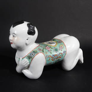 Chinese Republic Period Porcelain Headrest: Chinese Republic Period Porcelain Headrest in the Form of a Child, early 20th C. Nicely formed and glazed. 10" x 13" x 5 1/2" Property from the Estate of Marian Galewitz