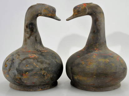 Pair of Chinese Pottery Duck Vases: Pair Chinese Pottery Duck Vases of Han Dynasty Style, likely of a later period. Nicely formed head, remnants of pigment on burnished surface. 14" and 15" high Property from a longtime Connecticut