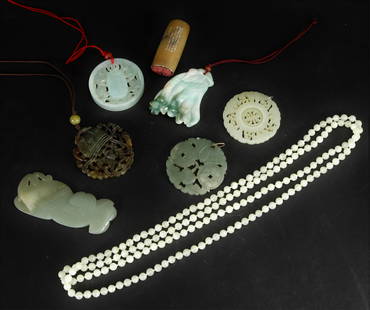 Group of Chinese Jade Pendants, Necklace: 6 Pendants, 1 Necklace and 1 hardstone seal. Includes a Buddha palm Citrus with an Insect. Seal; 2.25" hNecklace; 48"Pendants; 2" to 3.75" Property from the Estate of Sharon Kessler