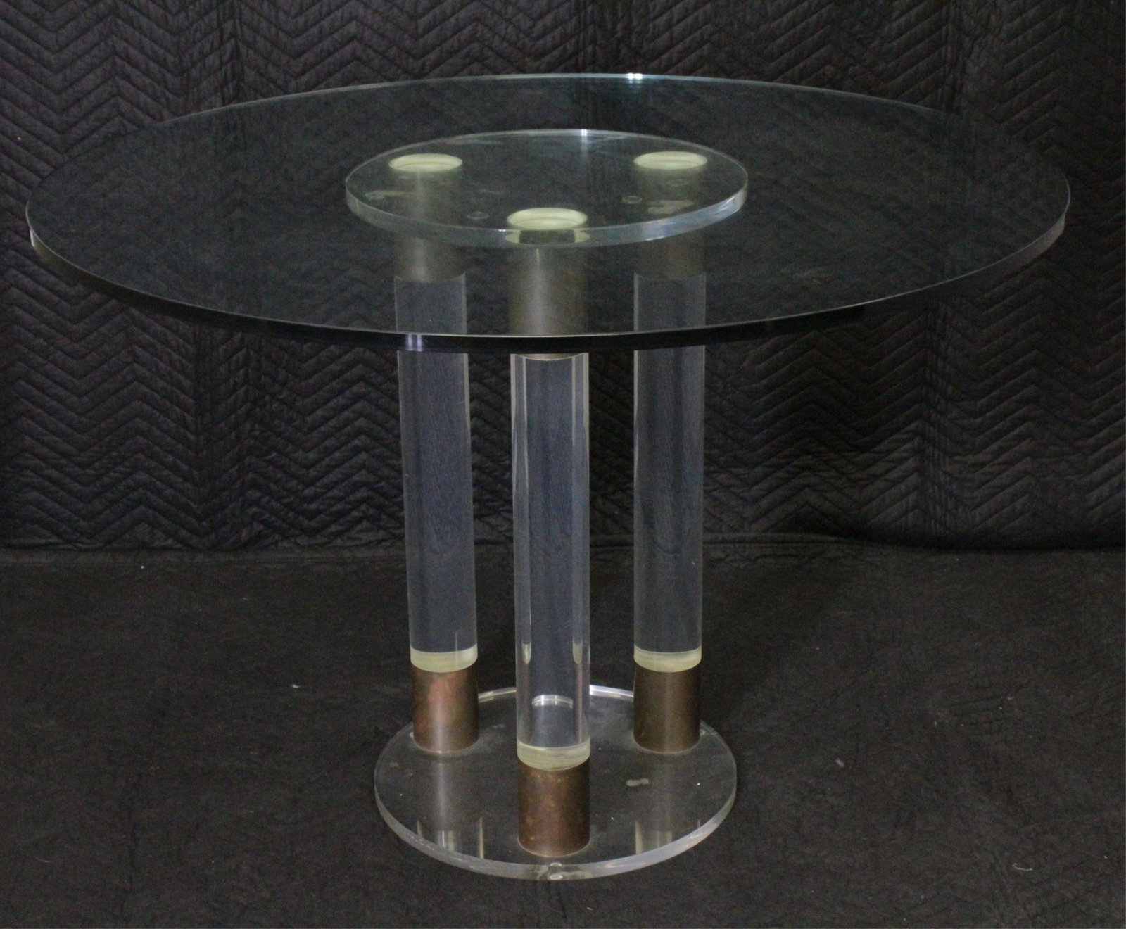 Charles Hollis Jones Style Lucite & Brass Table: Charles Hollis Jones Style Lucite & Brass Table, circa 1970 27.75" H x 40" diameter Property from the Estate of Marian Galewitz