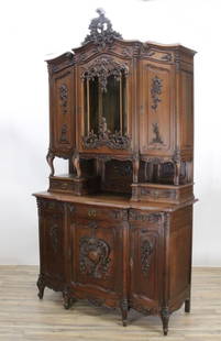 Louis XV Style Carved Walnut Buffet a Deux Corps: Louis XV Style Carved Walnut Buffet a Deux Corps, late 19th early 20th century 105.25" H x 58" W x 24.75" D Property from a Fine Collection of Antiques & Decorative Art, Rumson, New Jersey.