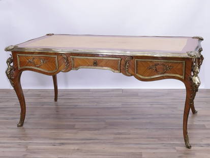 Louis XV Style Ormolu Tulipwood Bureau Plat: Louis XV Style Ormolu Mounted Tulipwood Bureau Plat after Cressant. 32.5" H x 70.5" W x 36" D Property from a Fine Collection of Antiques & Decorative Art, Rumson, New Jersey.