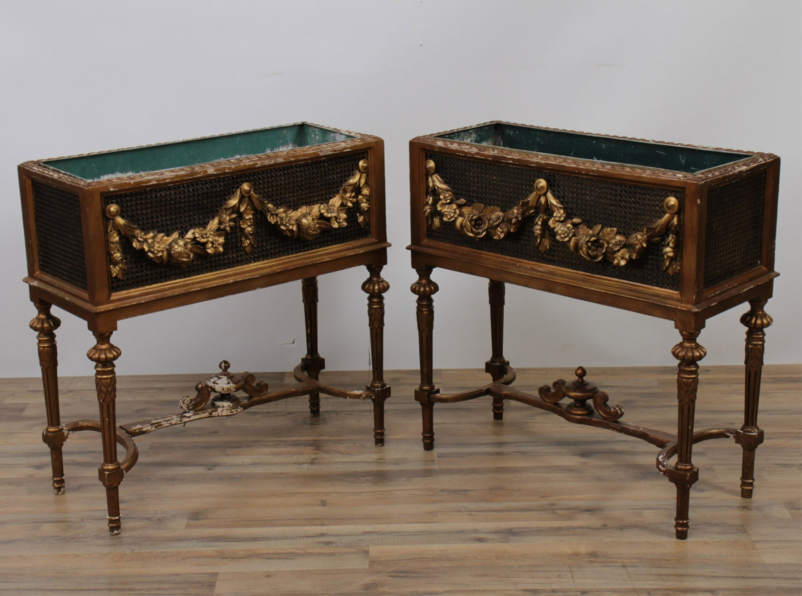 Pair of Louis XVI Style Carved Jardineres: Pair of Louis XVI Style Gold Painted and Carved Jardineres. 30.5" H x 29.75" W x 13" D Property from a Fine Collection of Antiques & Decorative Art, Rumson, New Jersey.