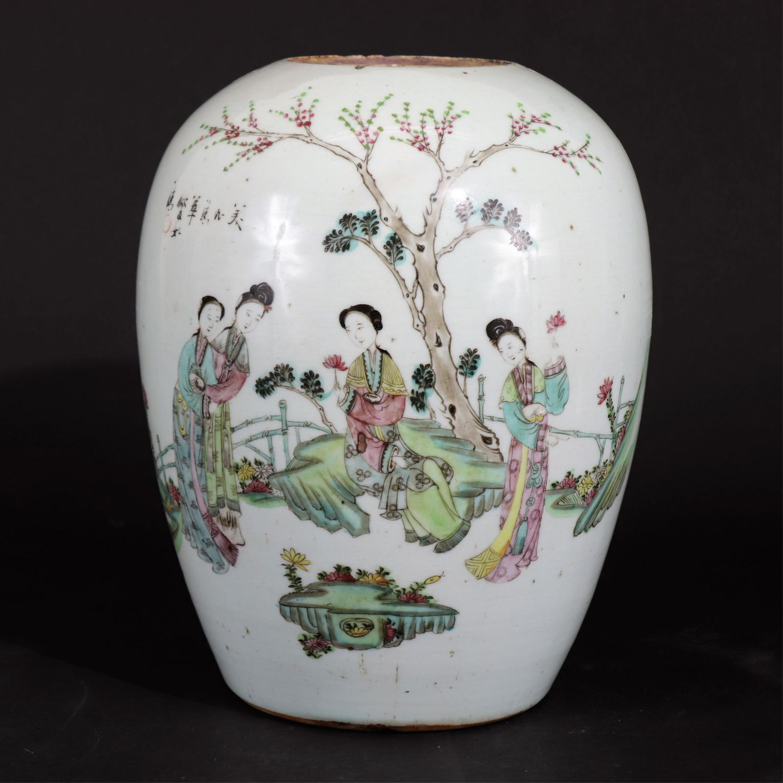 Chinese Ginger Jar: Very pale celadon ground with women in garden scene. Many character marks throughout. Dimensions:11" H x 8" diameter at widest. Top opening 3.75" diam. Property from a private collection