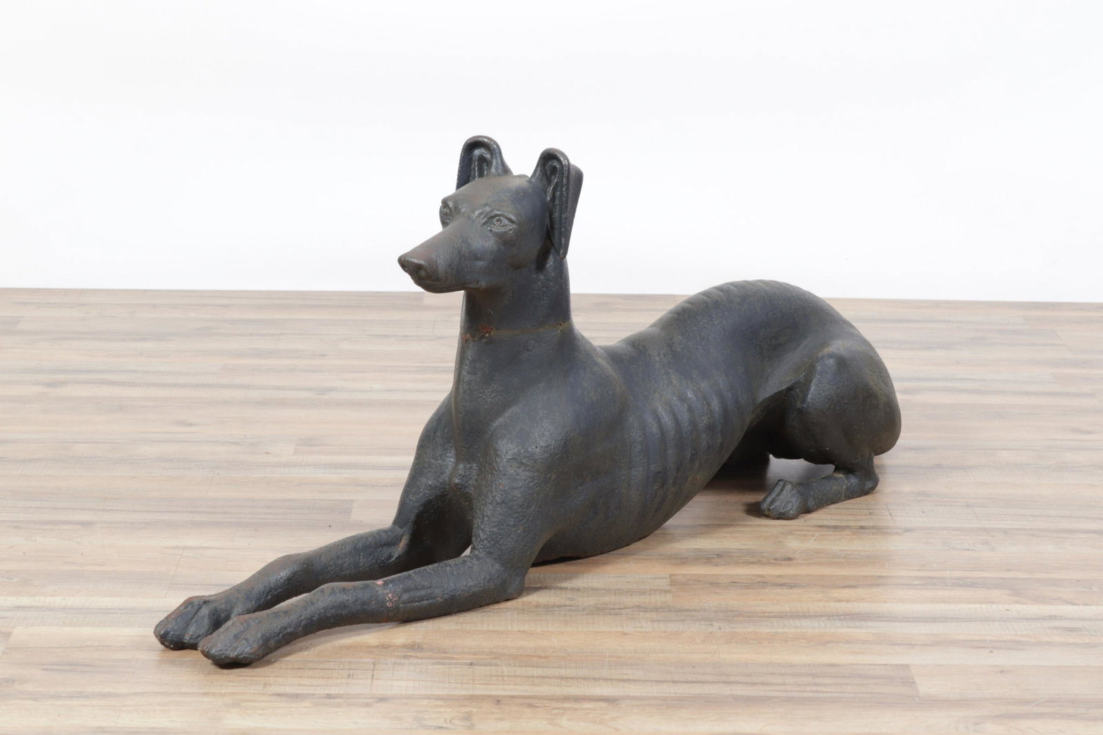 19th C. Cast Iron Greyhound, attrib J.W. Fiske: Late 19th C. Cast Iron Recumbent Greyhound or Whippet, attributed to the J.W. Fiske 1875-1899 Dimensions:21"H x 49"L x 12"W