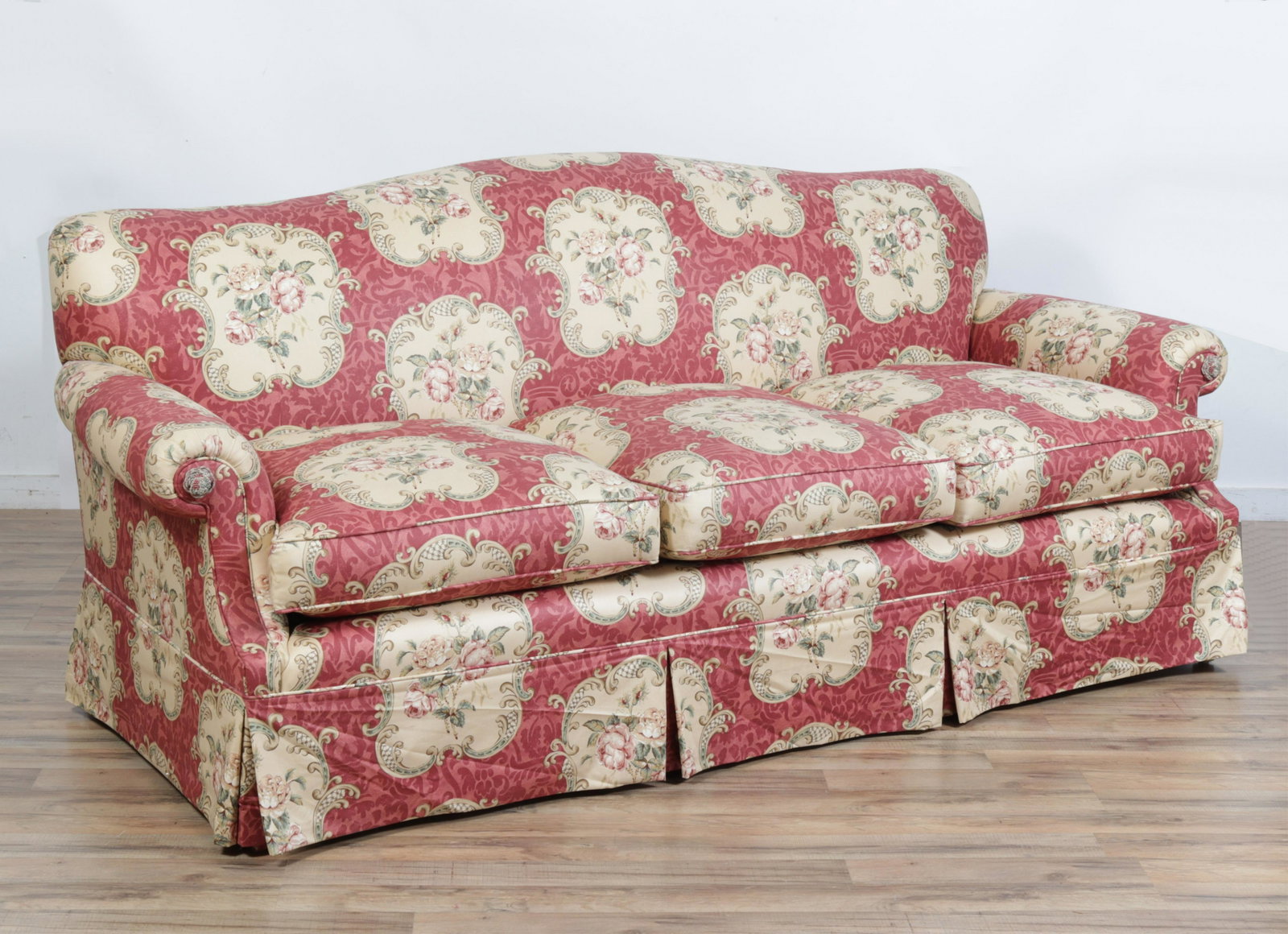 Modern Upholstered Couch: Modern Upholstered Couch, in foliate burgundy print cotton Dimensions:37.5" H x 87" W x 38" D Property from a private Park Avenue collection