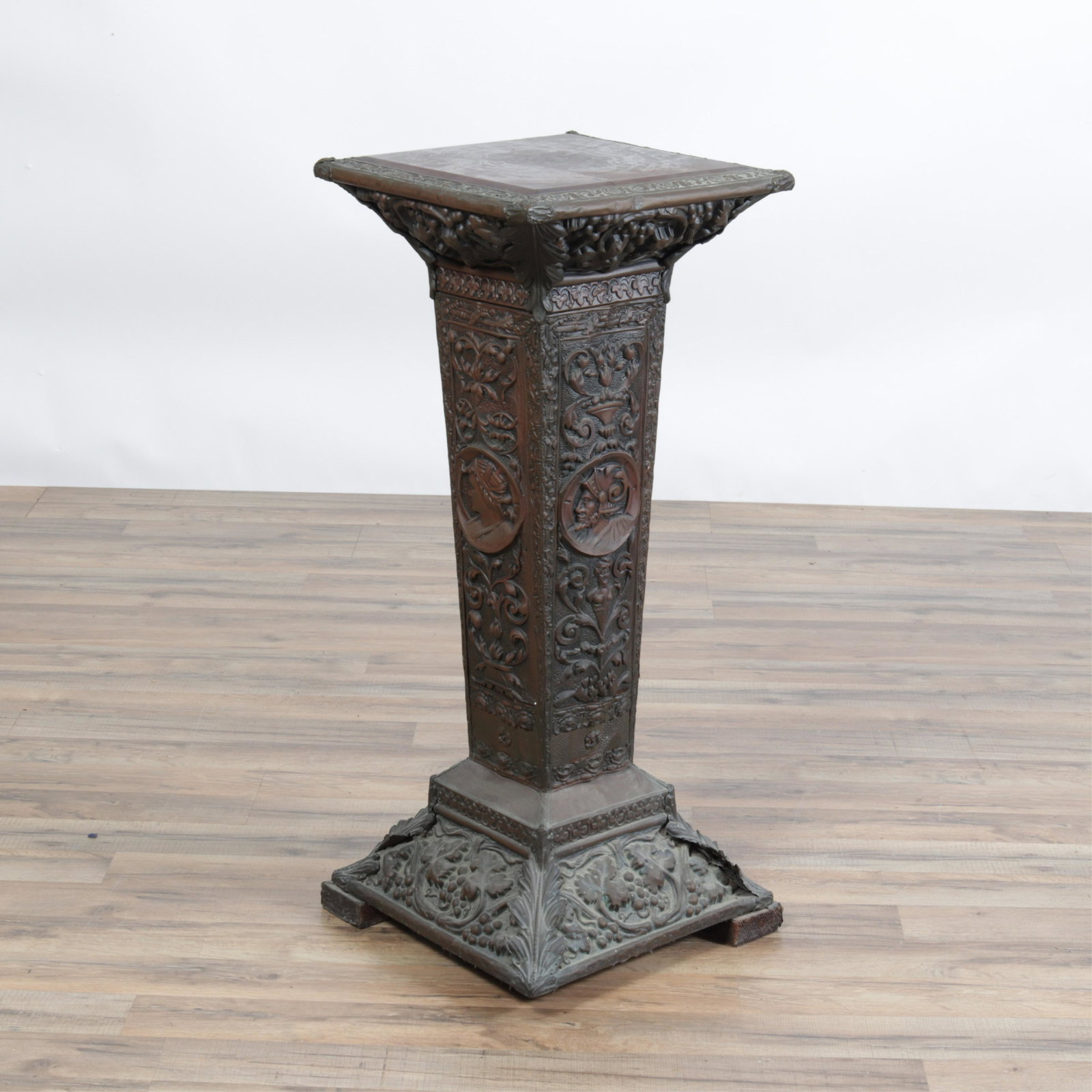 Renaissance Revival Repousse Brass Pedestal: Renaissance Revival Repousse Brass Veneered Pedestal, 19th C. Dimensions:37" H x 15.5" square Property from the collection of Dr. William and Mary Smith Liebesman, Deal, NJ.