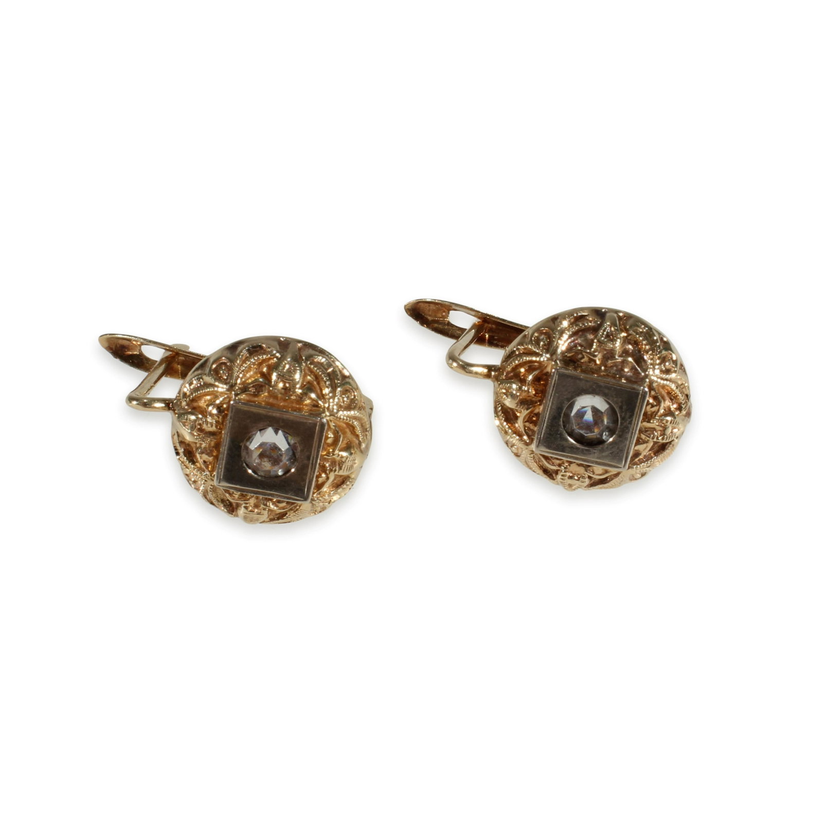 Edwardian Era Gold Earrings: A pair of 12k yellow gold earrings with clear center gem. Stamped 500 on back. Latch back closures. 0.5" long. 2.5 grams. Property from a private New York estate