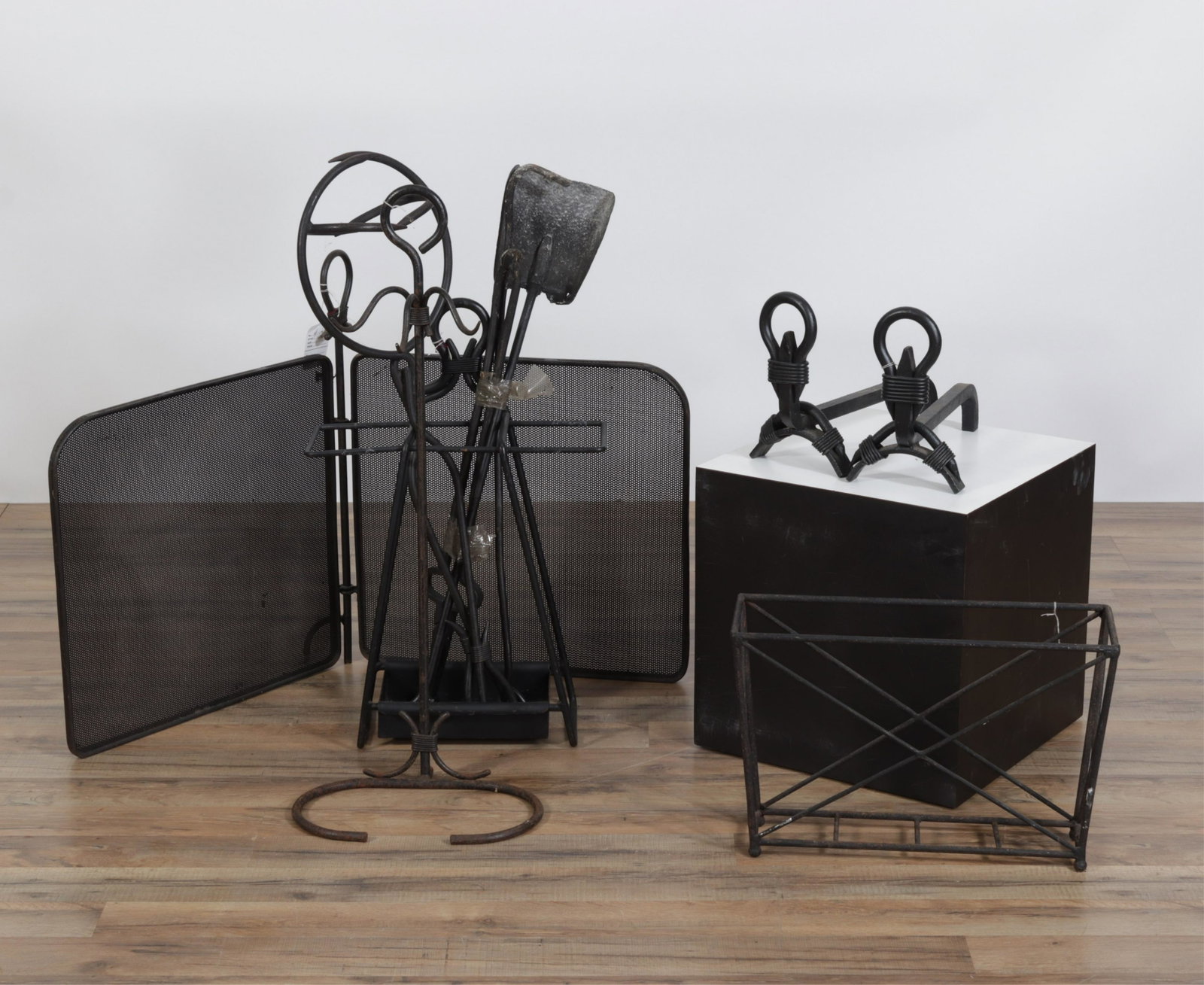 Group of Mid Century Fireplace Equipment: Group of Mid Century Fireplace Equipment, pair andirons, 3 stands, 4 tools and screen Dimensions: Largest stand 34.75" H