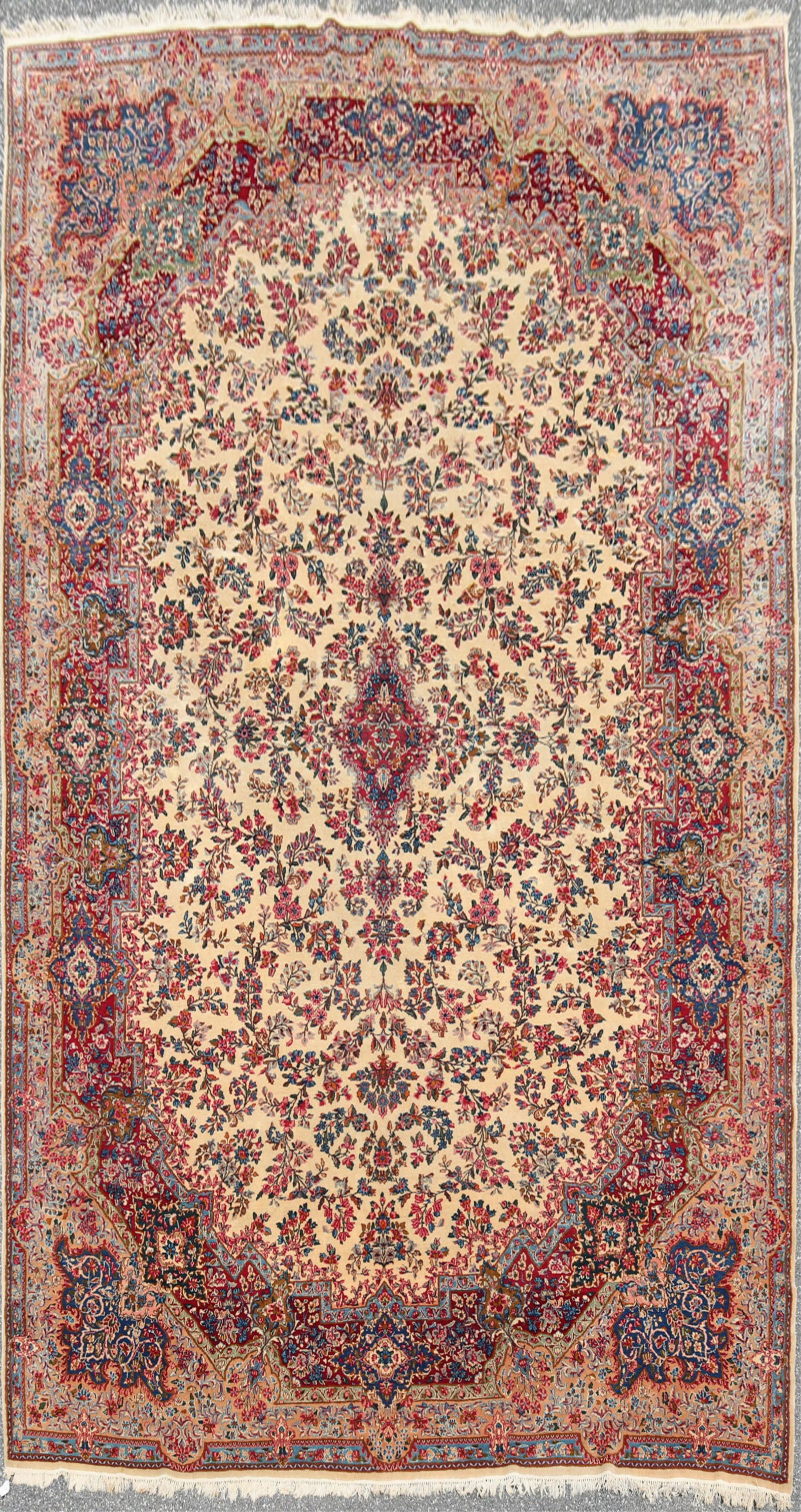 Persian Lavar Kerman Wool Rug 11-3 x 15-9: Persian Lavar Kerman Rug Semi Antique Wool Rug, ivory ground with small central floral medallion in rose blue and pale green floral motif throughoutDimensions: 11-3 x 15-9