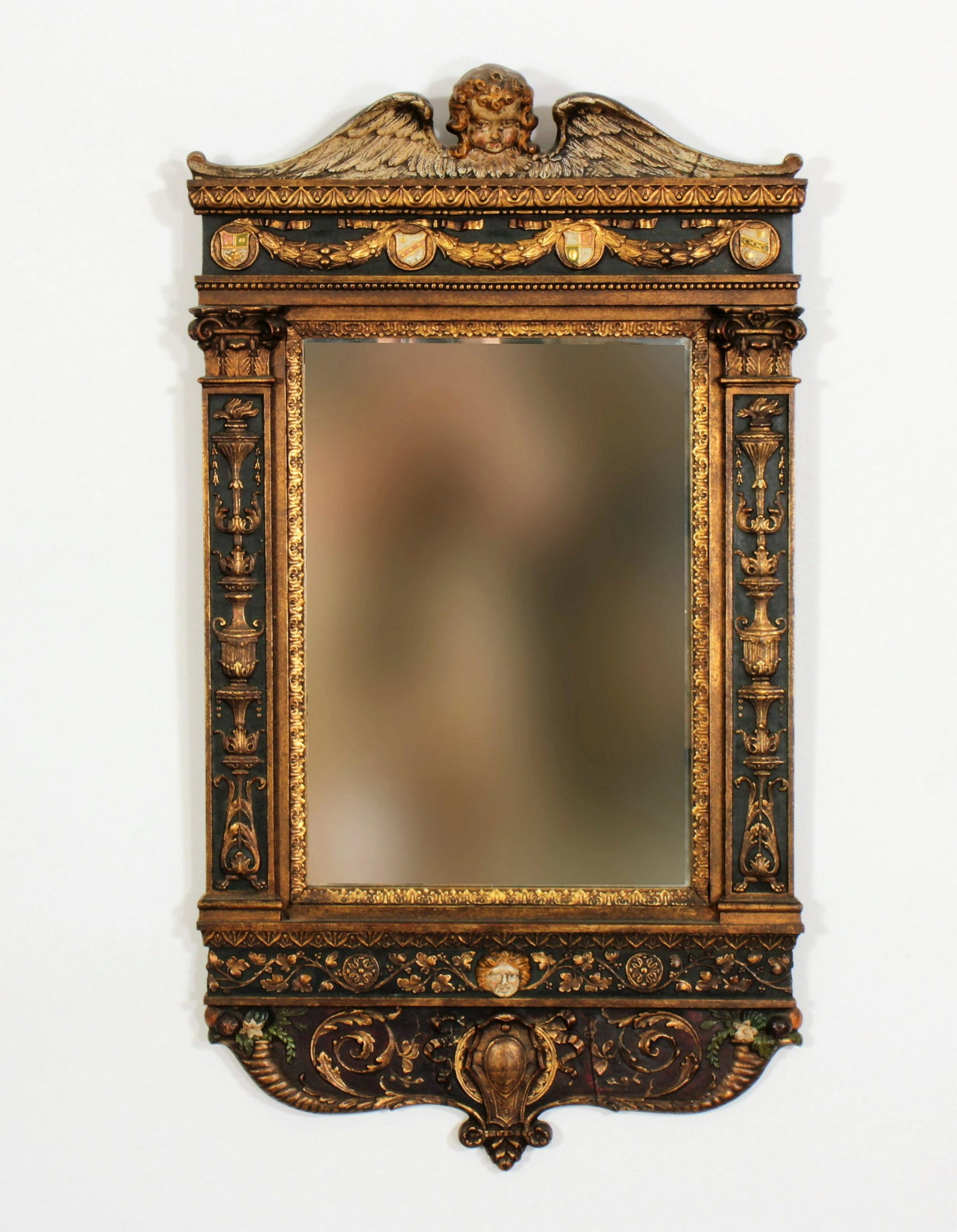 Italian Renaissance Style Giltwood Painted Mirror: Italian Renaissance Style Giltwood Painted Mirror, surmounted with winged putti, urn crest an floral swag motifs throughout, base framed with cornucopia Dimensions: 39 1/2 x 21