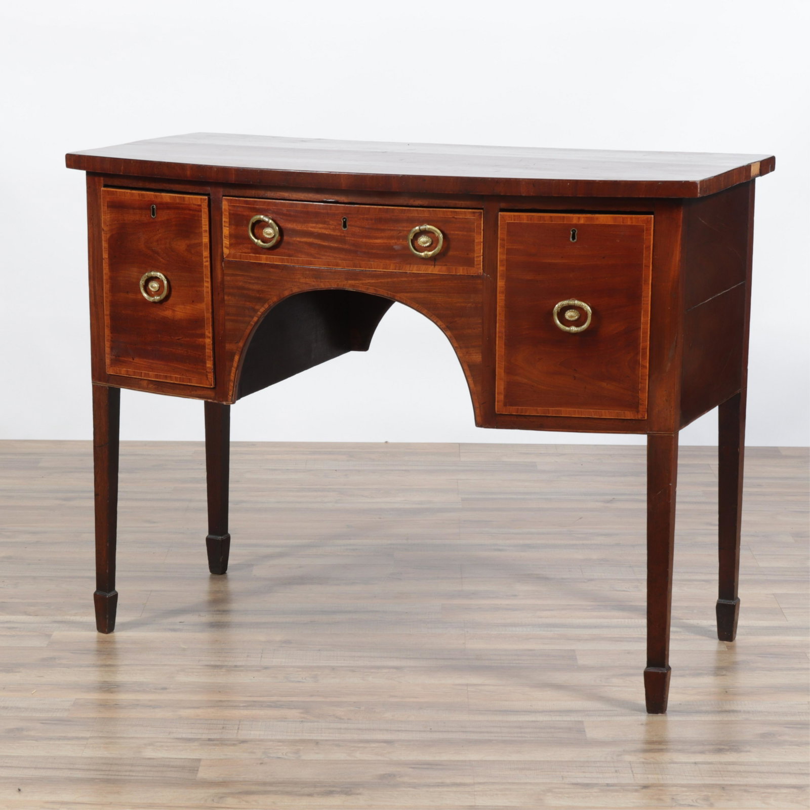 19C English Diminuitive Sideboard: Center drawer flanked either side by diagonally shaped drawers. Drawers function smoothly. Dimensions: 48"W x 24.5 deep x 37H