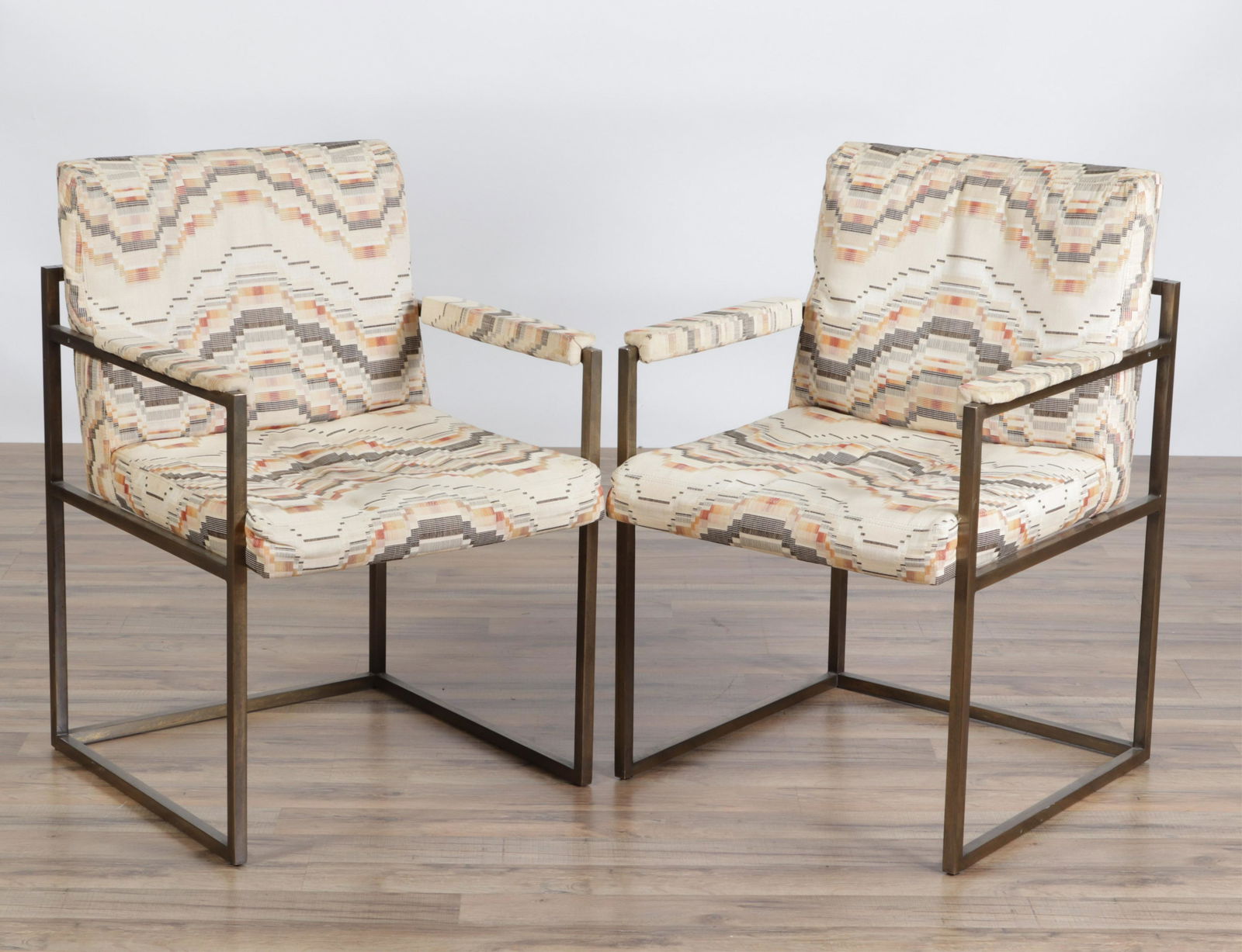 Pair Milo Baughman Metal Armchairs, c.1970: Pair Milo Baughman Metal Armchairs, circa 1970, upholstered in geometric cottonDimensions: 33.25" H x 22.5" W x 23" D