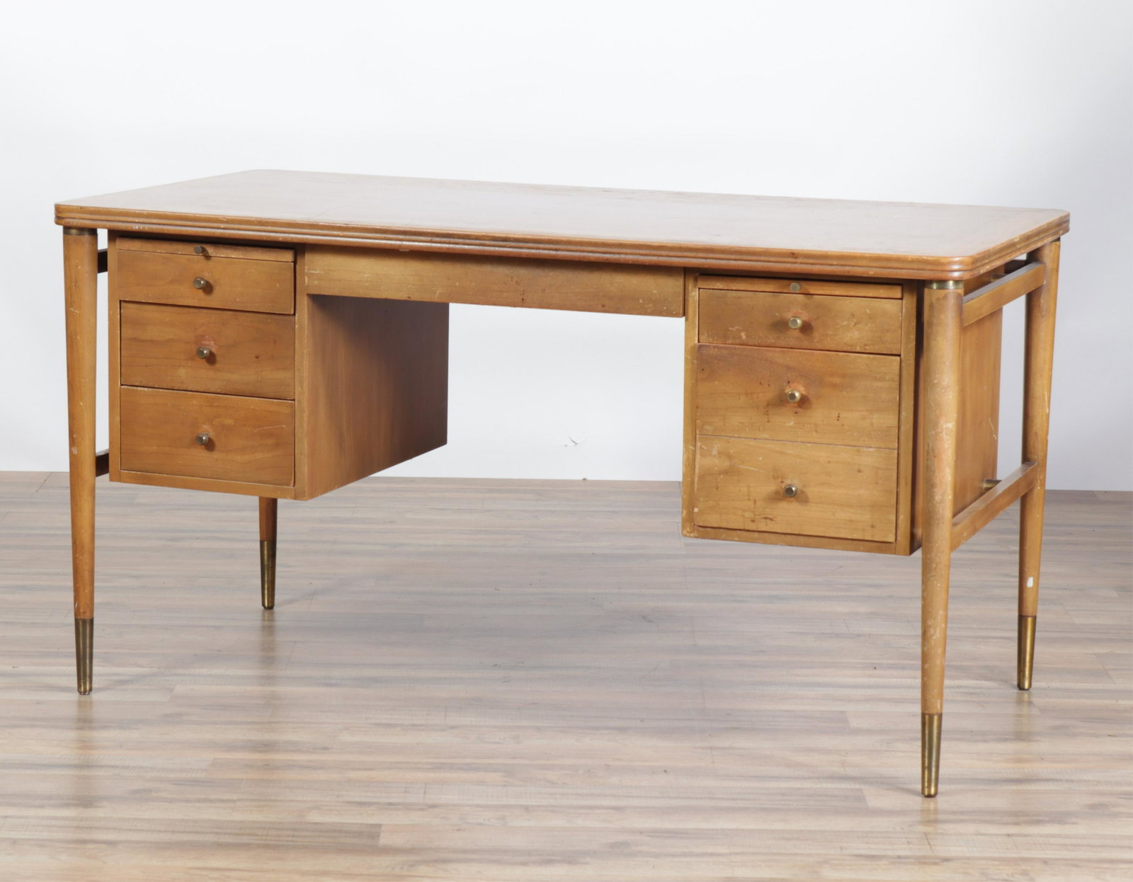John Widdicomb Brass Mounted Cherry Desk: John Widdicomb Brass Mounted Cherry Desk Dimensions: 29.25" H x 54" W x 27" D