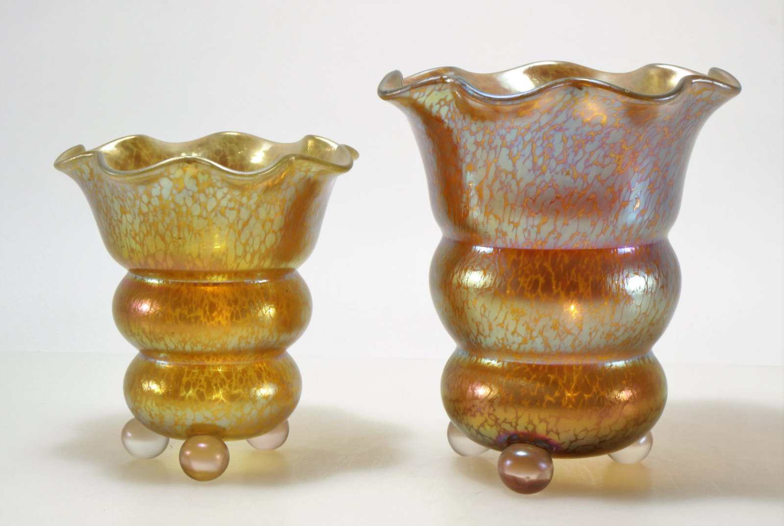 Loetz - 2 Czechoslovakia Iridescent Glass Vases: 2 Loetz Czechoslovakia Iridescent Glass Vases, each signed in Loetz Czecho-slovakian fashion Dimensions: Taller 7.75" H Property from the Estate of John 'Parker' Prindle, Jr., Boston, MA.