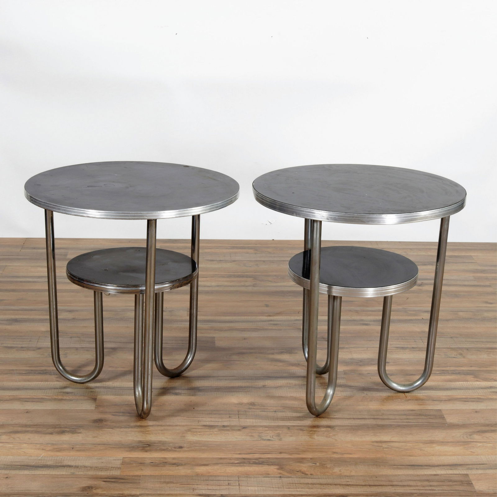Near Pair Wolfgang Hoffmann Art Deco Side Tables: Near Pair of Wolfgang Hoffmann Art Deco Side Tables, circa 1930. Decal Royalhouse Manufacturing, Chicago, IL. Dimensions: 25.25" H x 24" diam Property from the Estate of John 'Parker' Prindle, Jr., Bo