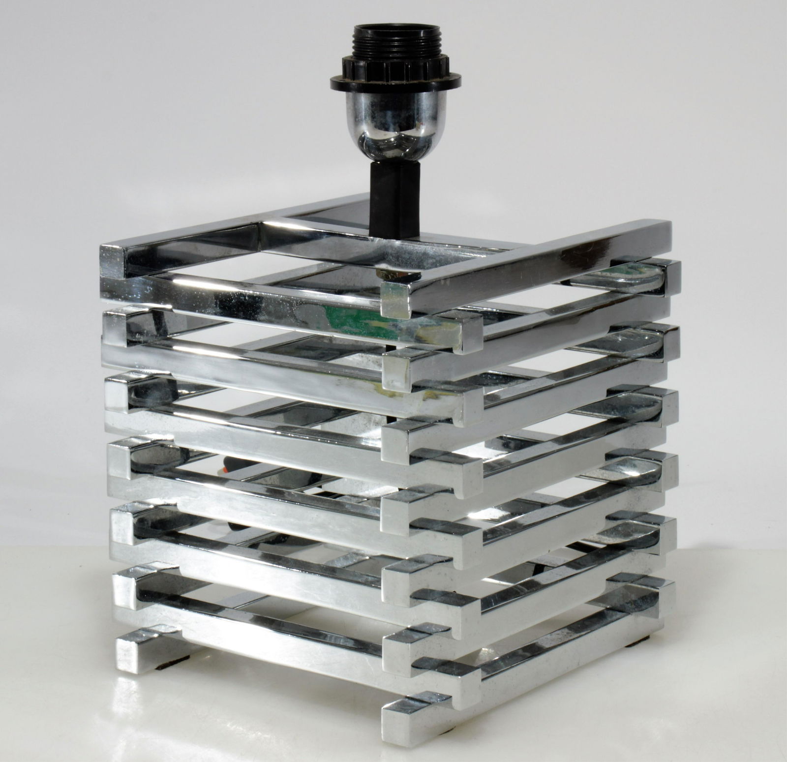 Gaetano Sciolari Chrome Table Lamp, 1970s: Midcentury modern, Gaetano Sciolari chromed brass cage form table lamp. Dimensions: 7.75" H x 8" Square (excluding socket) Property from the Estate of John 'Parker' Prindle, Jr., Boston, MA.