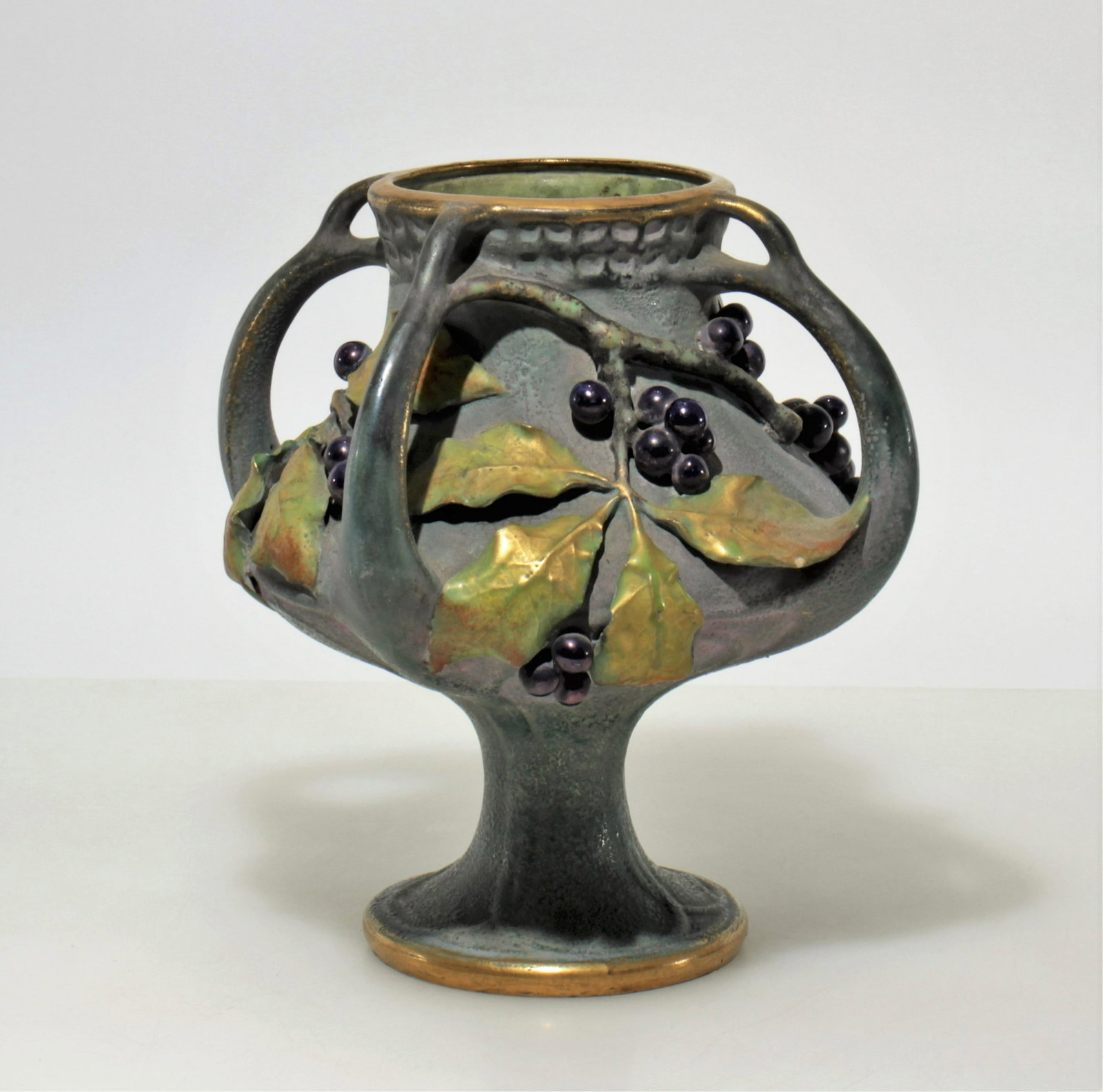 Paul Dachsel - Amphora Grape Vine Vase, E 20th C.: Paul Dachsel Amphora "Grape Vine" Vase, Early 20th C., impressed 2057, 70, Teplitz-Turn mark Dimensions: 8.5" H Property from the Estate of John 'Parker' Prindle, Jr., Boston, MA.