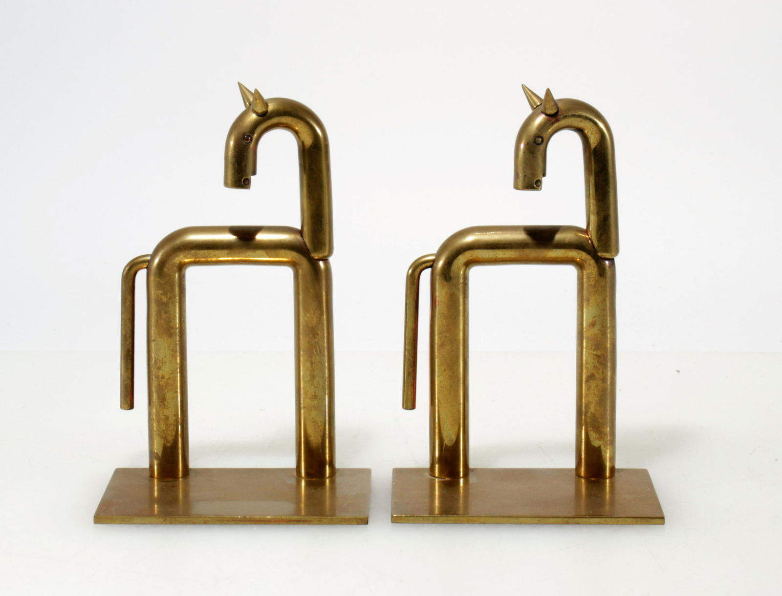 Pair of Walter Von Nessen Style Horse Bookends: Pair of Walter Von Nessen Style Horse Bookends. Bronze plated copper. Dimensions: 6.25" H x 4" W x 2.5" D Property from the Estate of John 'Parker' Prindle, Jr., Boston, MA.