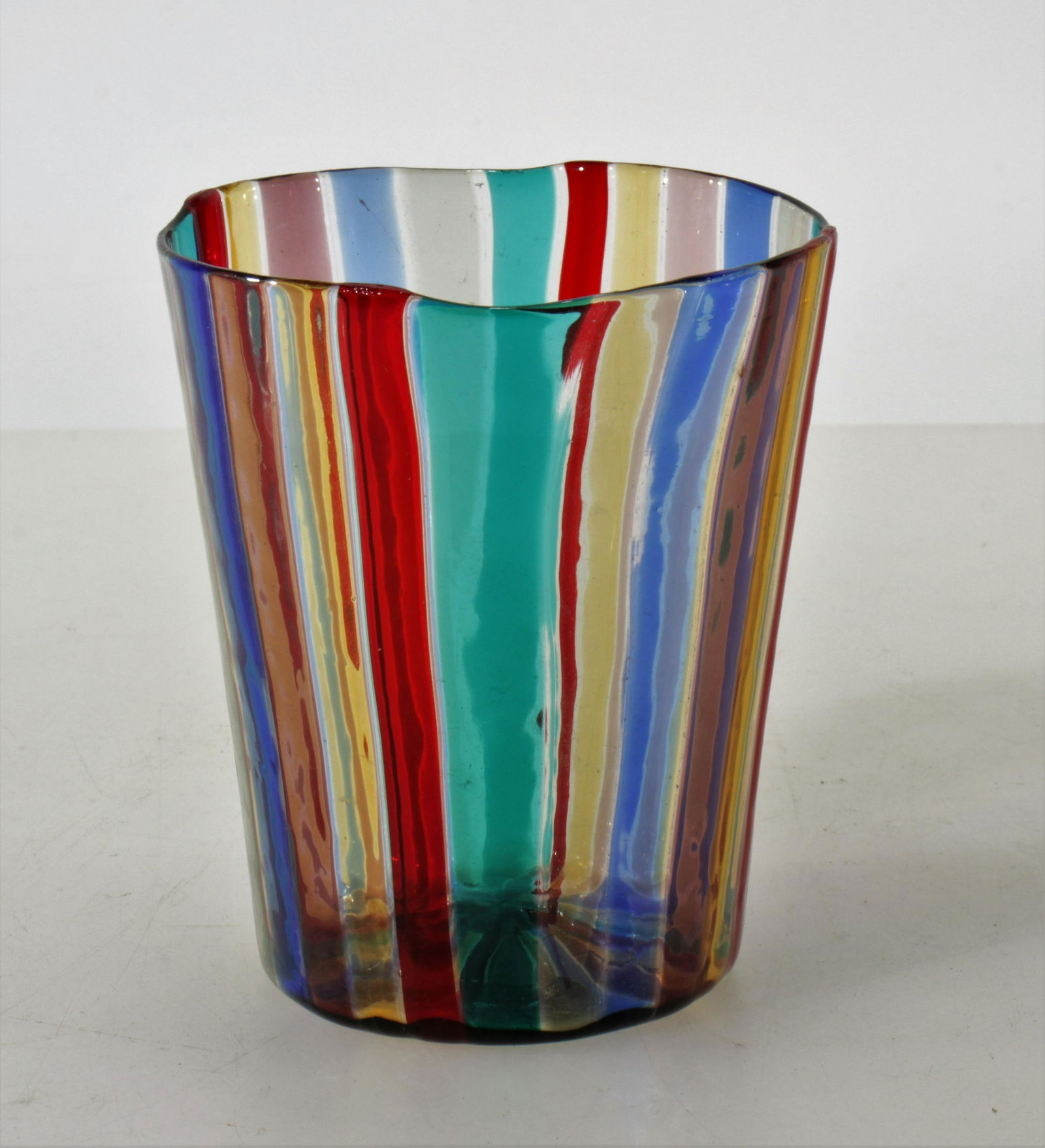 Attrib. Gio Ponti / Venini "A Canne" Cup: Attrib. Gio Ponti / Venini "A Canne" Cup, Mid 20th C., multicolor, unsignedDimensions: 4" H Property from the Estate of John 'Parker' Prindle, Jr., Boston, MA.