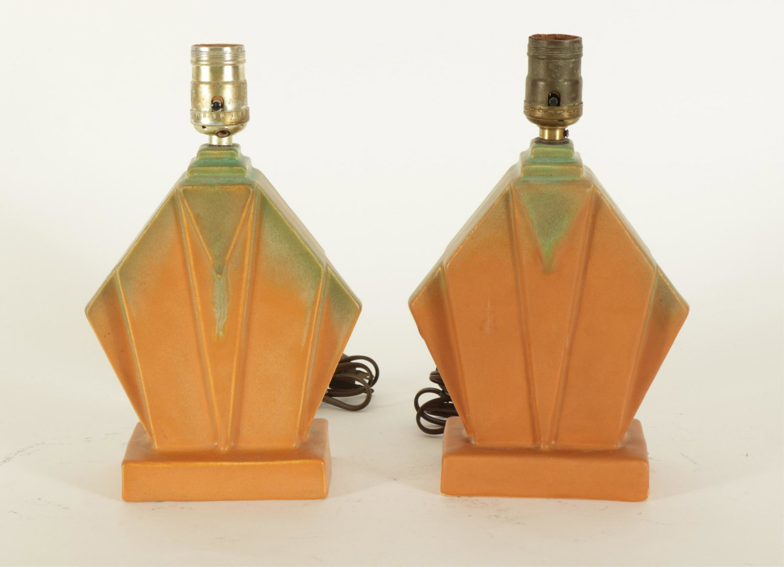 Pair of Raeben Haley Muncie Pottery Lamps: Pair Raeben Haley Muncie Pottery Lamps, one impressed MUNCIE Dimensions: To the fixture 8.25" H Property from the Estate of John 'Parker' Prindle, JR., Boston, MA.