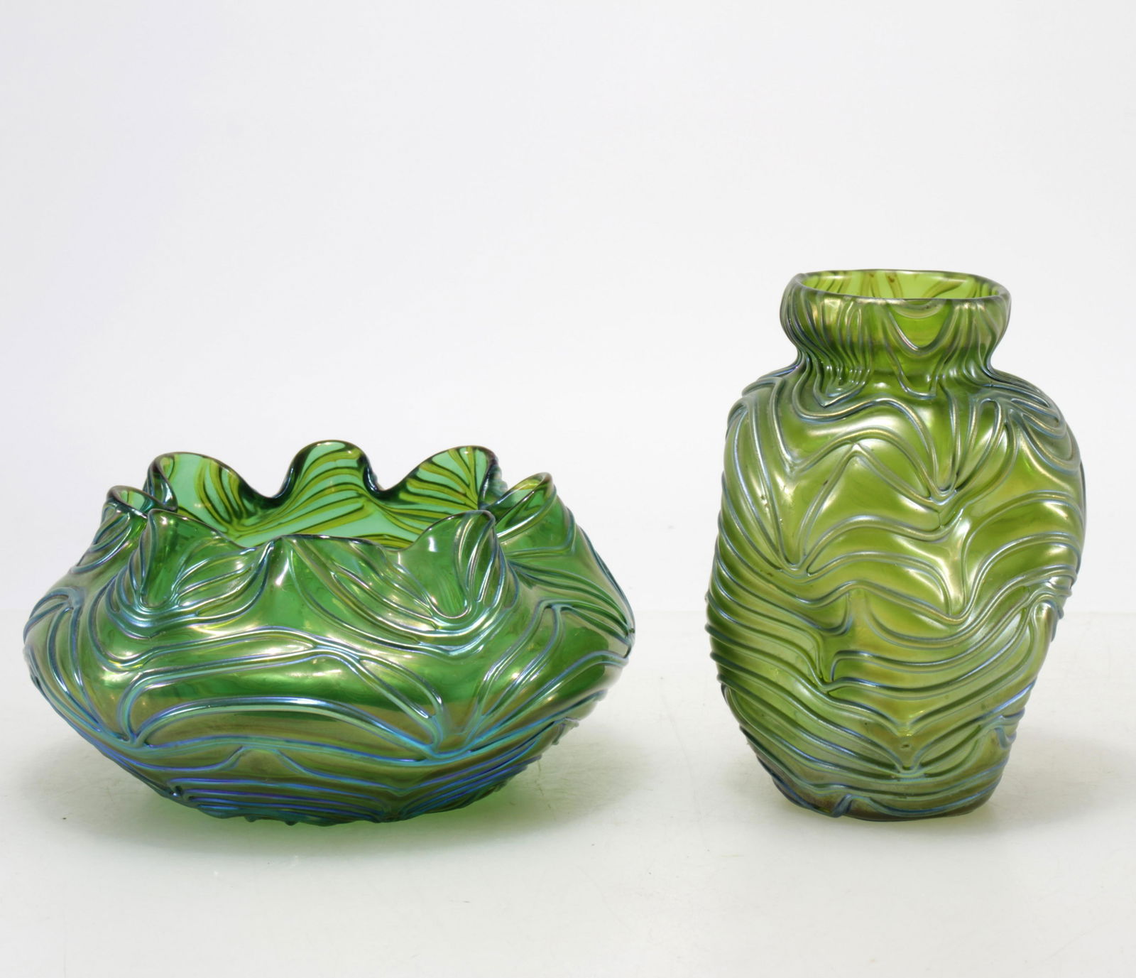 Two Loetz "Formosa" Iridescent Glass Vases: Two Loetz "Formosa" Iridescent Glass Vases, unsigned Dimensions: Taller 5.5" Hbowl 3.5"H Property from the Estate of John 'Parker' Prindle, JR., Boston, MA.