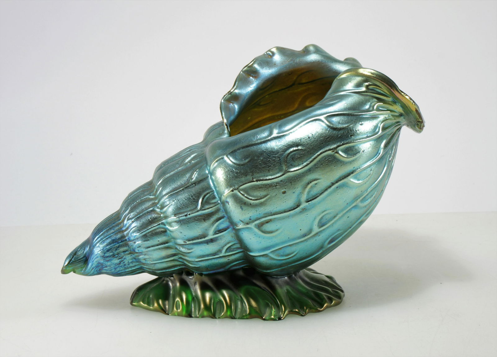 Loetz - Iridescent Glass Neutalis Vase: Loetz Iridescent Glass Neutalis Vase, unmarked Dimensions: 12" L x 8"H x 6.75"D Property from the Estate of John 'Parker' Prindle, JR., Boston, MA.