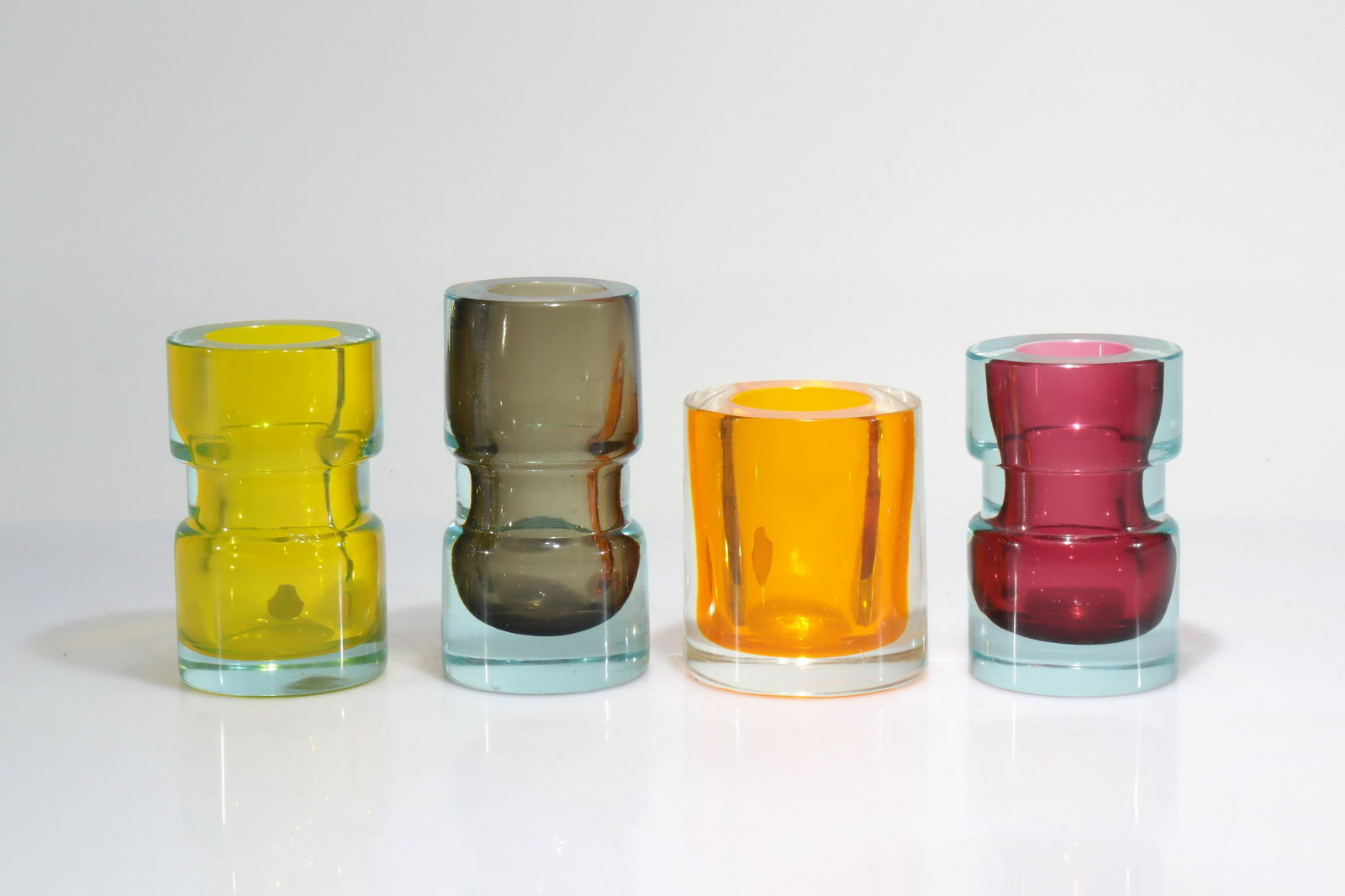 Flavio Poli, Seguso - Four Sommerso Glass Vases: Flavio Poli / Seguso, Four Sommerso Glass Vases. Mid Century 20th Century. Two with paper label. Dimensions: Largest - 5.5" H Property from the collection of John 'Parker' Prindle, Jr.