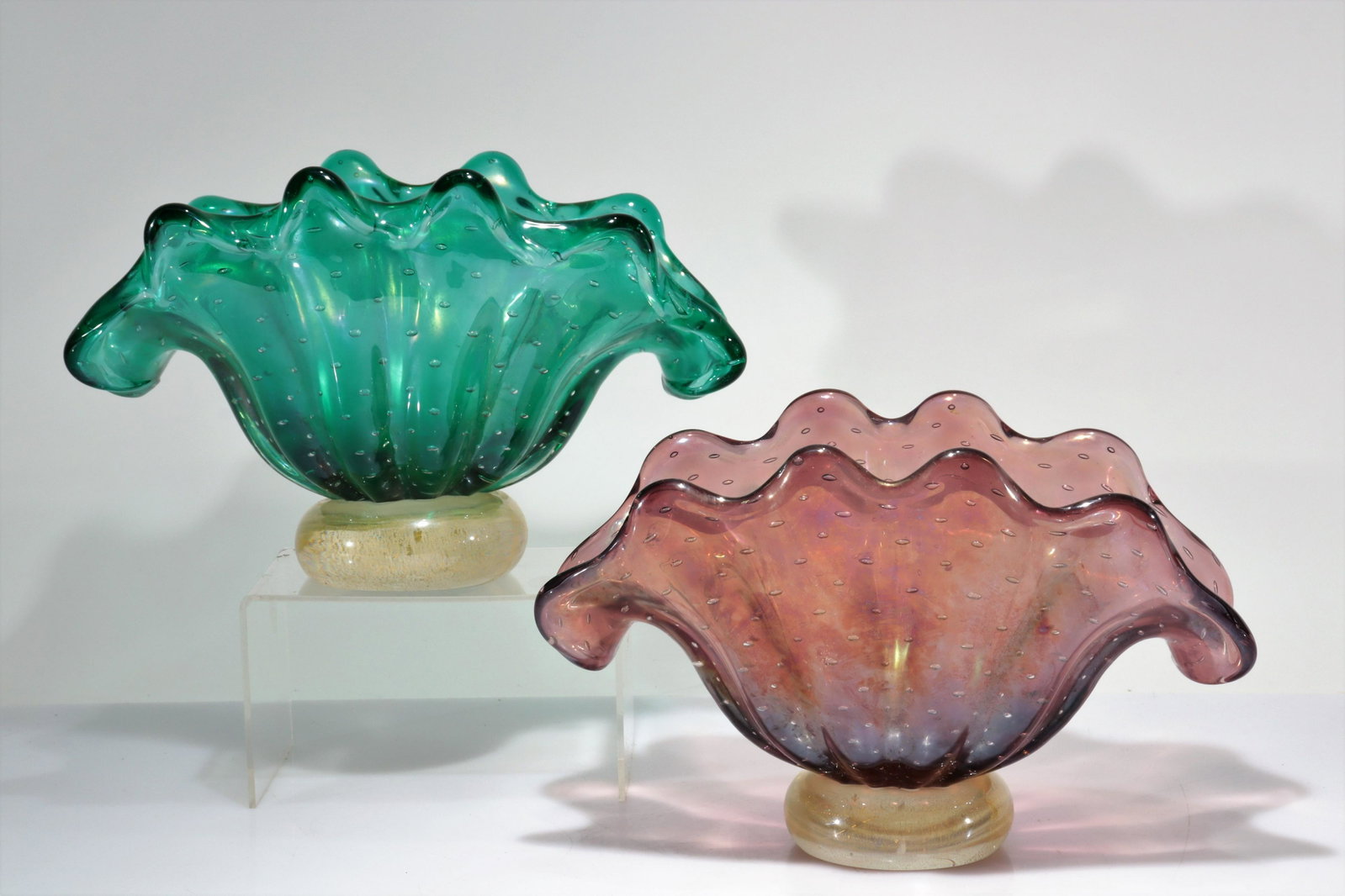 Attr. Barovier - Two Iridescent Bullicante Bowls: Two Attr. Barovier Iridescent Bullicante Shell Form Bowls, Mid 20th C., unmarked Dimensions: 7" H x 11" W Property from the collection of John 'Parker' Prindle, Jr.