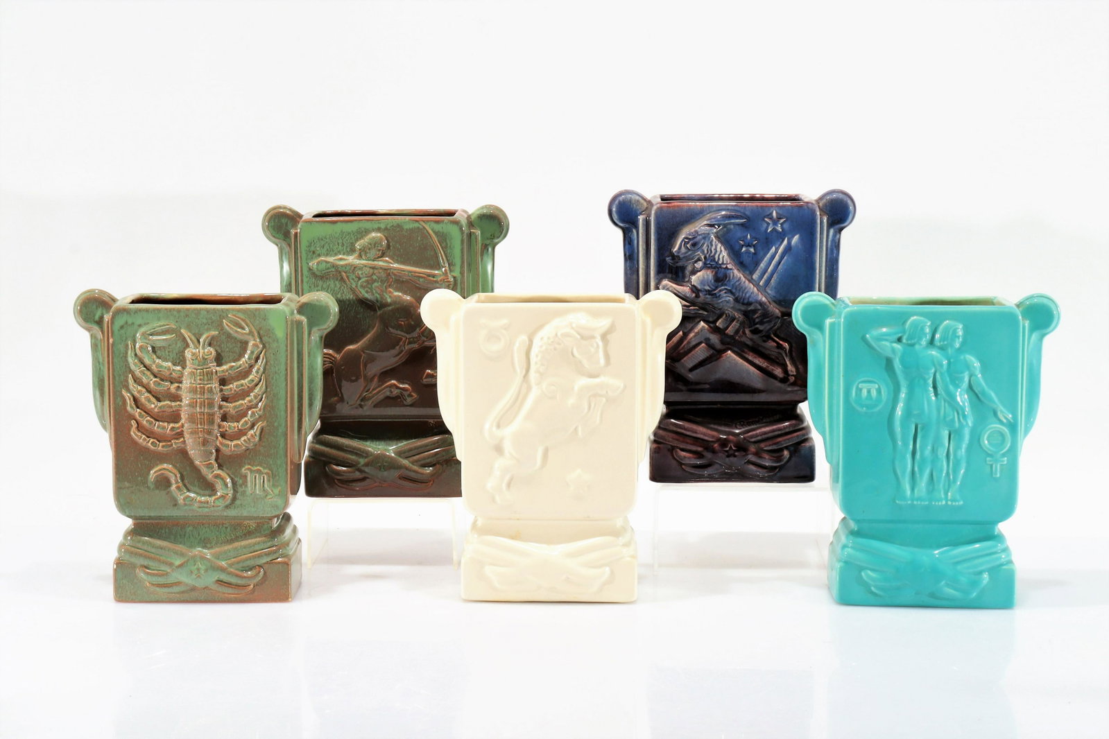 Metlox Poppy Trail - Zodiac Pottery Vases: Metlox Poppy Trail, Zodiac Pottery Vases designed by Carl Romanelli. Dimensions: 8" H Property from the collection of John 'Parker' Prindle, Jr.