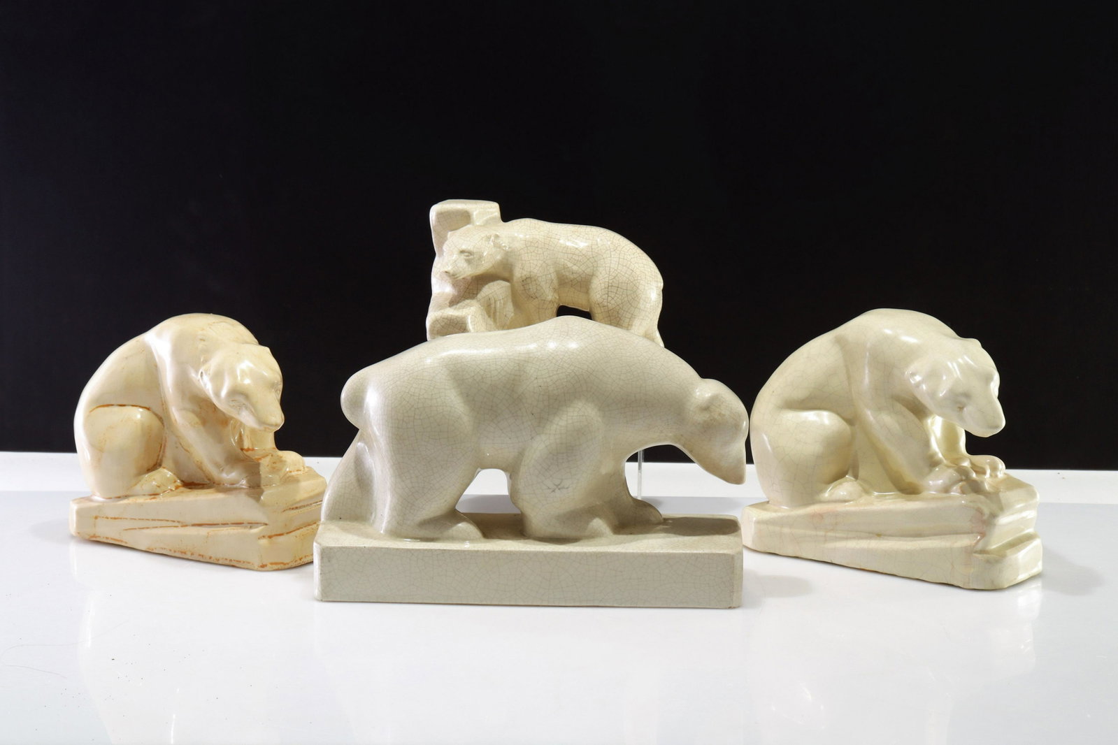 4 Art Deco Pottery Polar Bears: 4 Art Deco Pottery Polar Bears, 1 Clement, 2 marked Made in France Dimensions: Largest 11.25" L x 7.25" H Property from the collection of Seymour Stein.