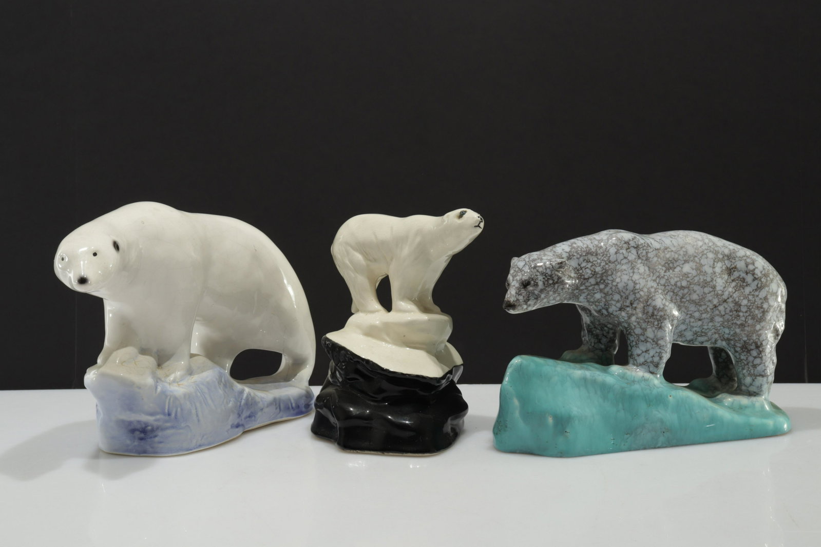 3 Vintage Pottery Polar Bears: 3 Vintage Pottery Polar Bears, one marked Eastgate. Dimensions: Largest 10.75" L x 7" H Property from the collection of Seymour Stein.