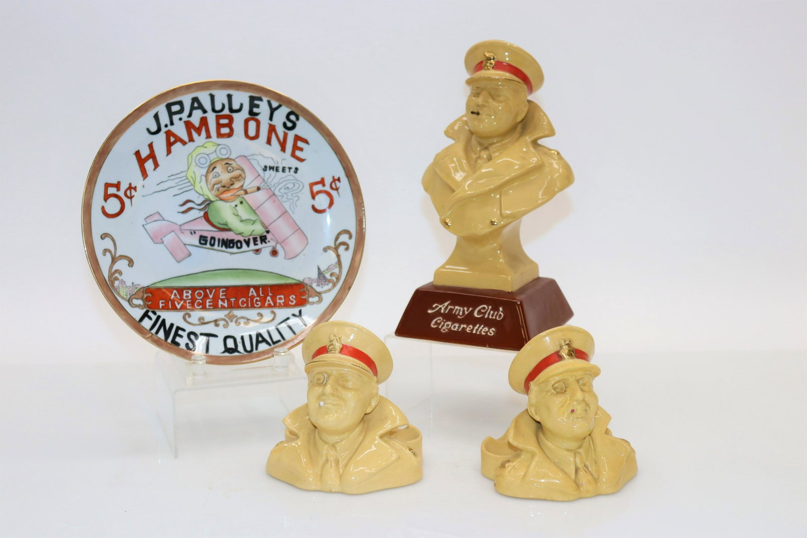 Army Club Cigarette & Other Ads: 3 Army Club Cigarette & J. Paulley Ads, ceramic Dimensions: Tallest 10.75" H Property from the collection of Seymour Stein.