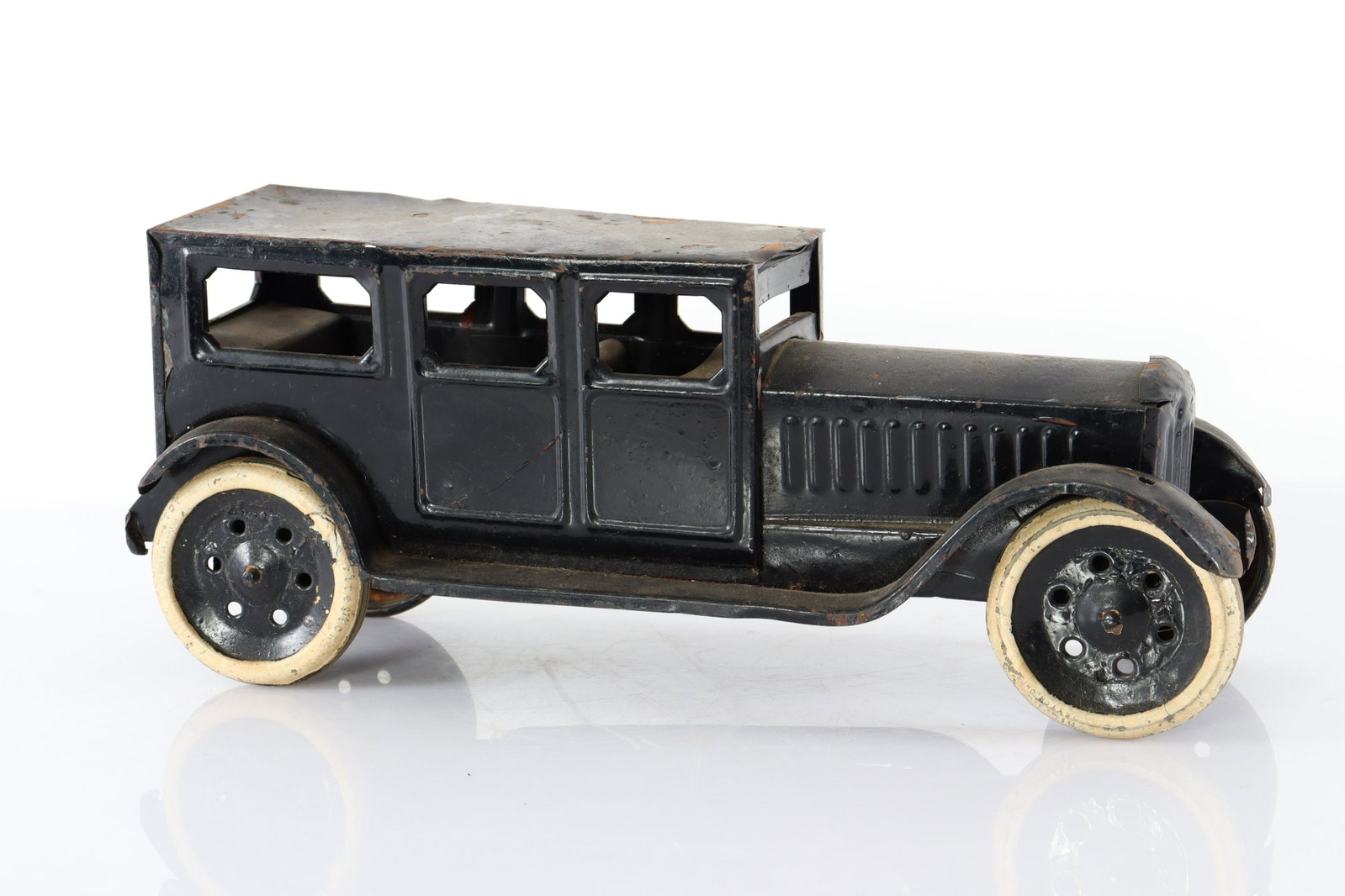 Schiebel Pressed Steel Sedan, Firestone Tires: Schiebel Pressed Steel Sedan, Firestone Tires, signed Schiebel Toy Dayton Ohio Dimensions: 17.5" L Property from the collection of Seymour Stein.